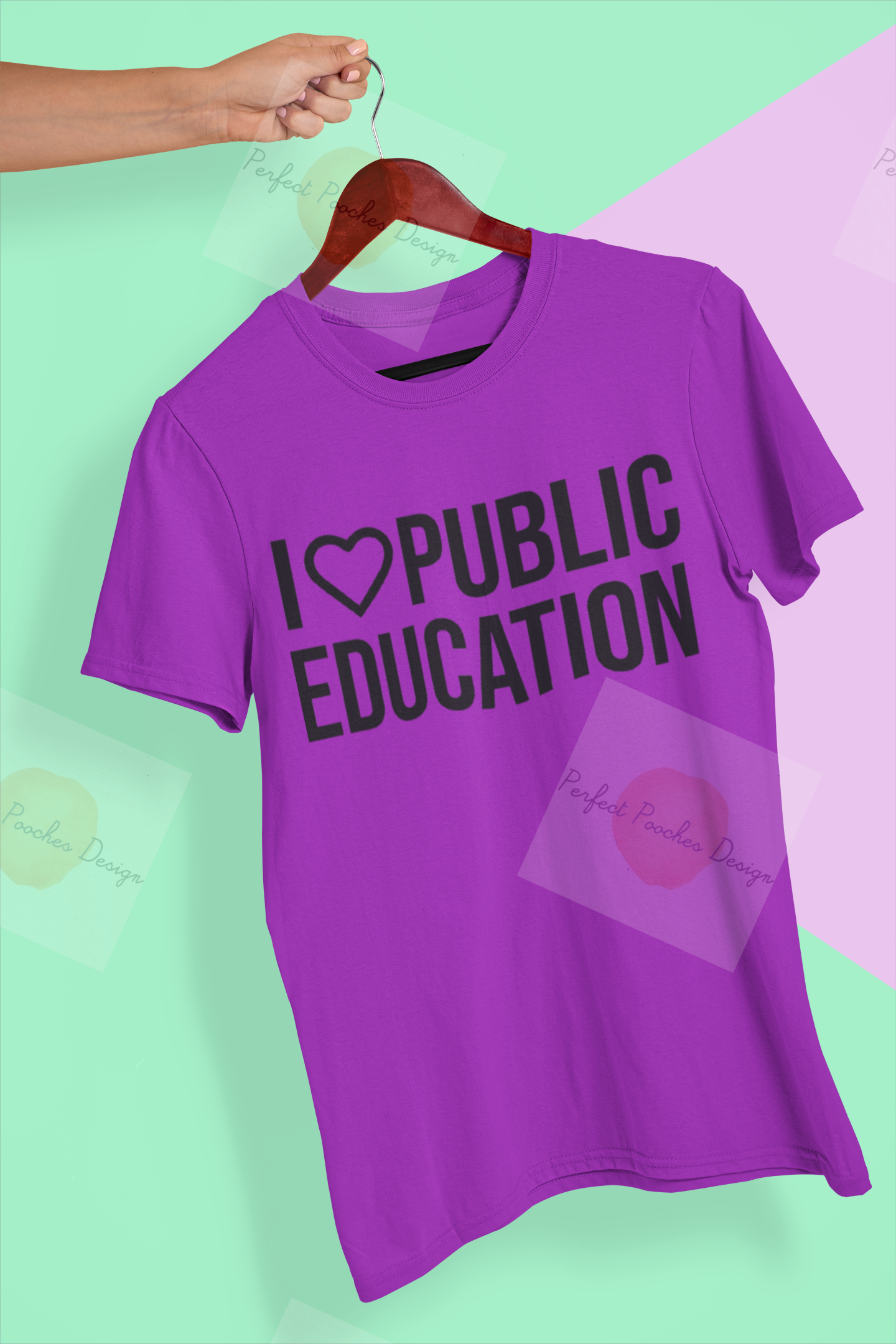 mockup-of-a-hand-holding-a-t-shirt-in-a-colorful-background-26735 (4).png