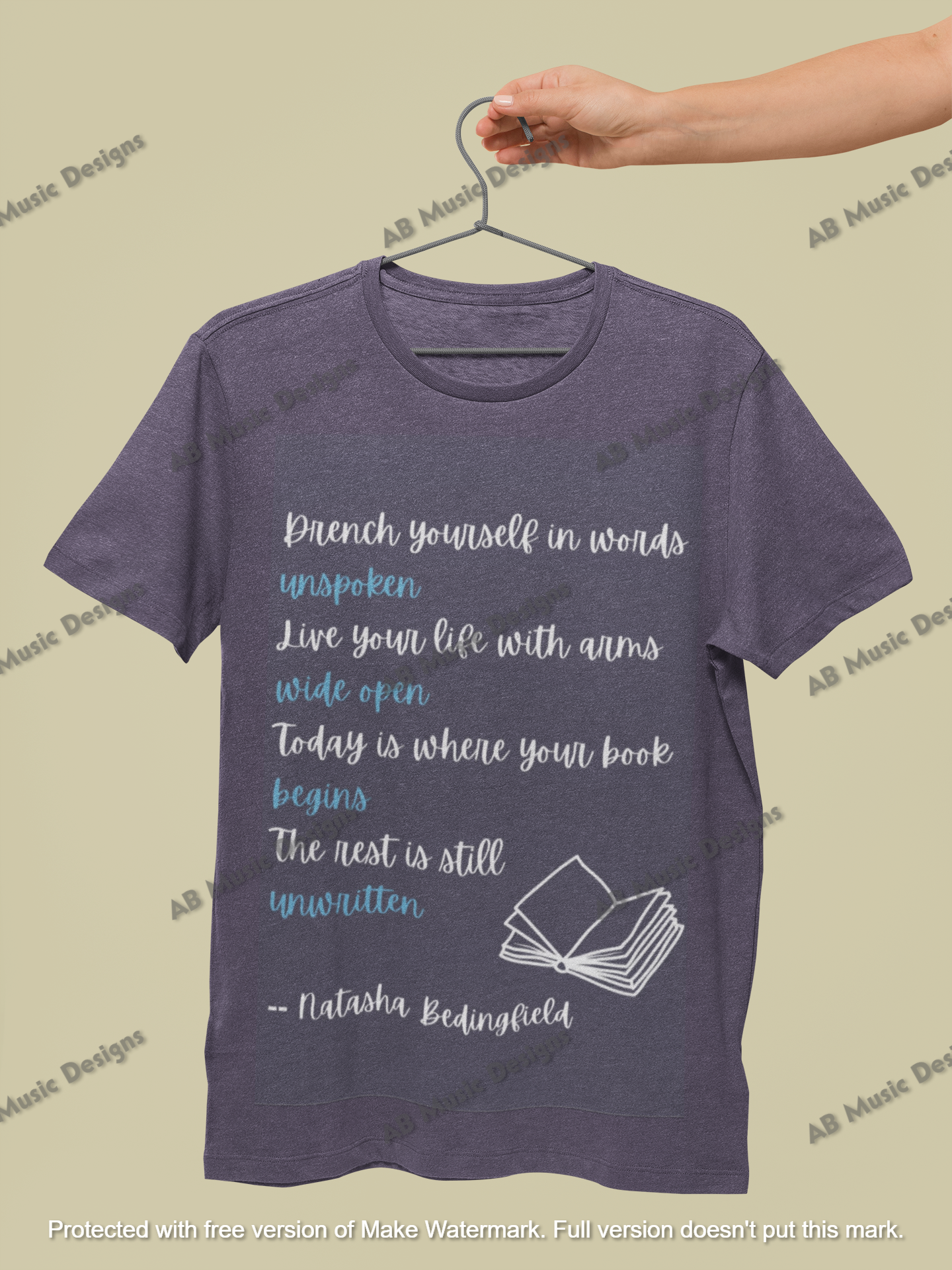 mockup-of-a-hand-holding-a-t-shirt-against-a-minimalist-background-27687.png