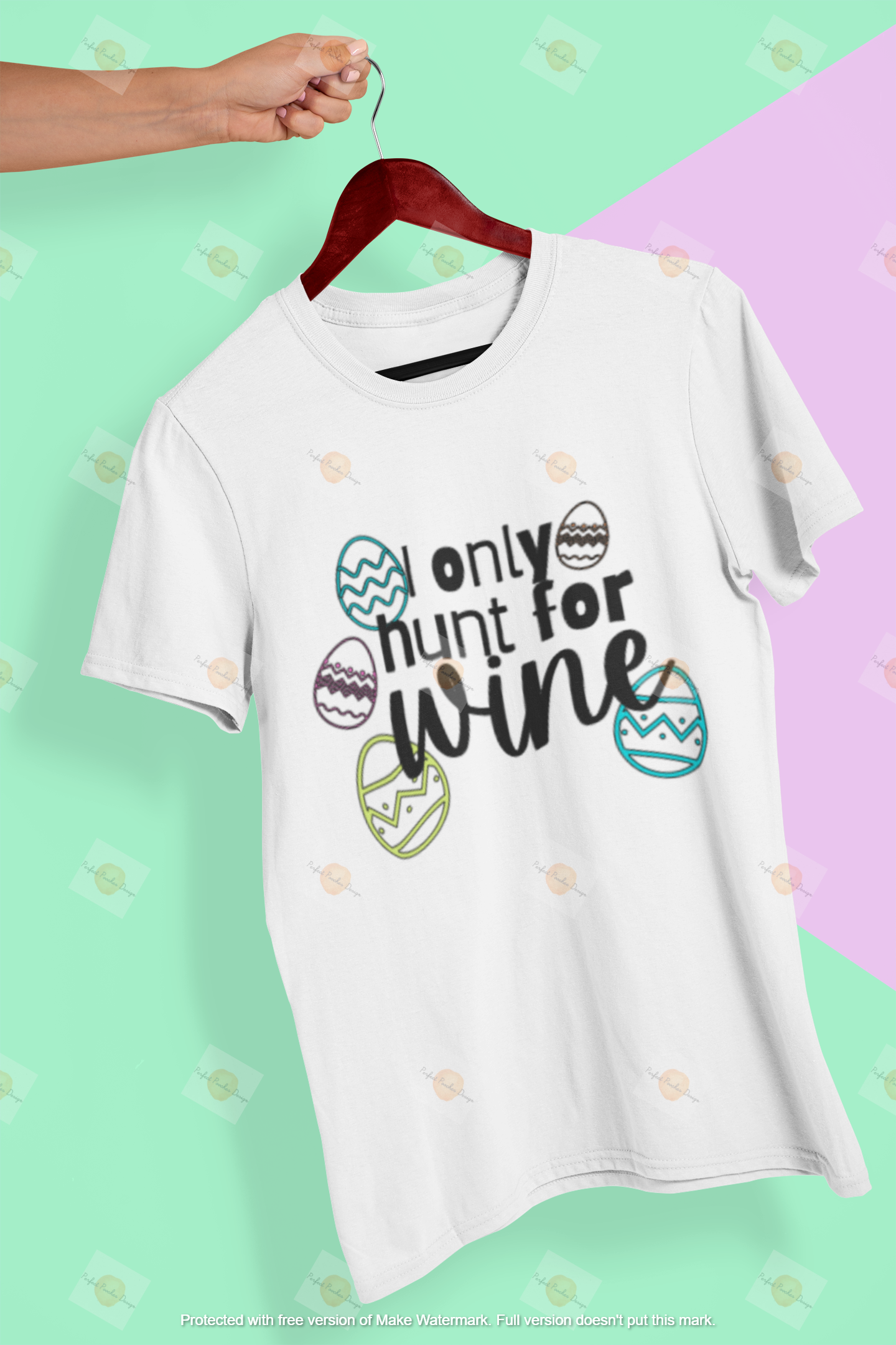 mockup-of-a-hand-holding-a-t-shirt-in-a-colorful-background-26735.png