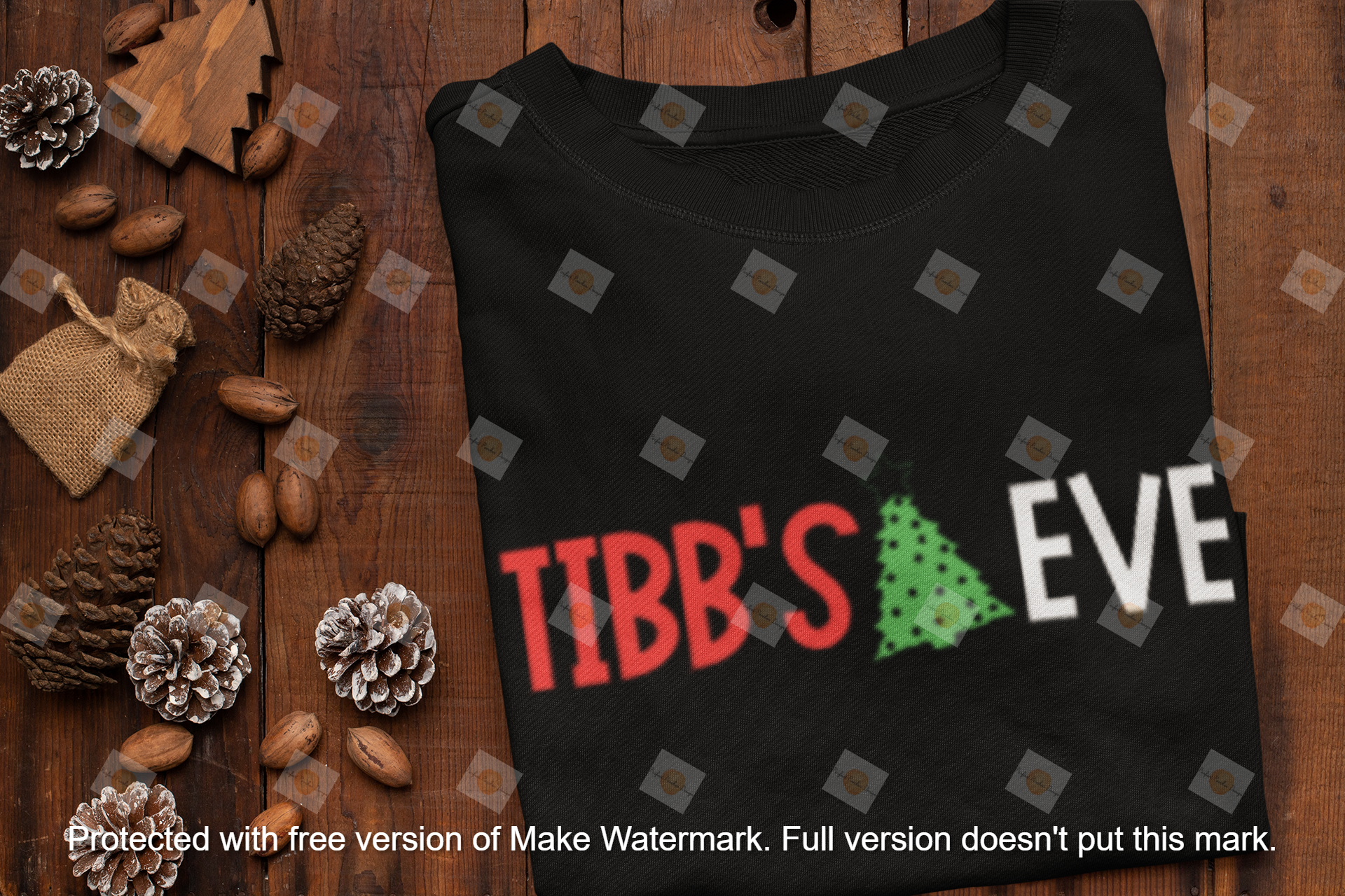 mockup-of-a-folded-sweatshirt-surrounded-by-winter-decorations-m155.png