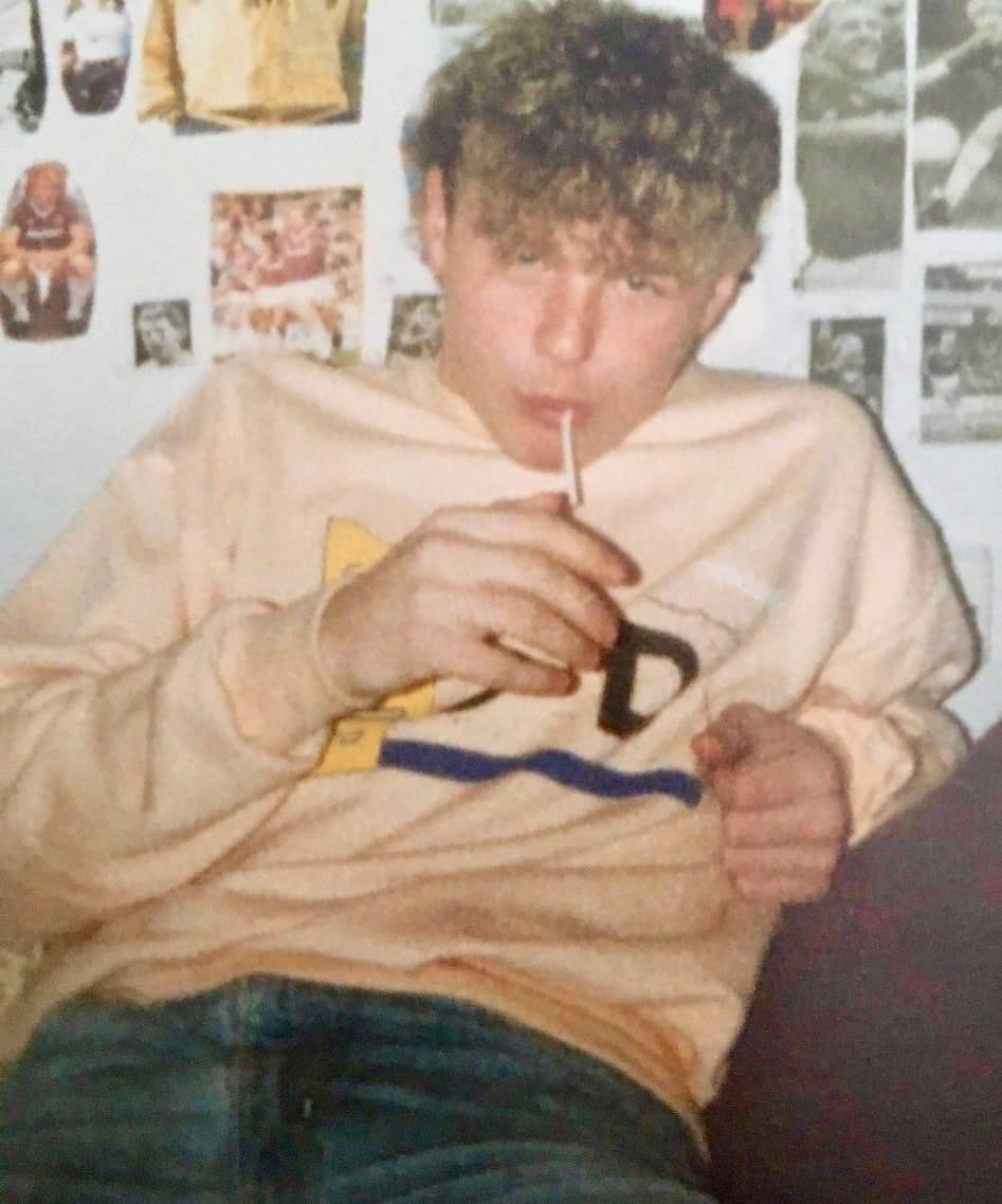 “Teenager wearing peach sports sweatshirt from JD Sports Manchester Arndale in the 1980s”