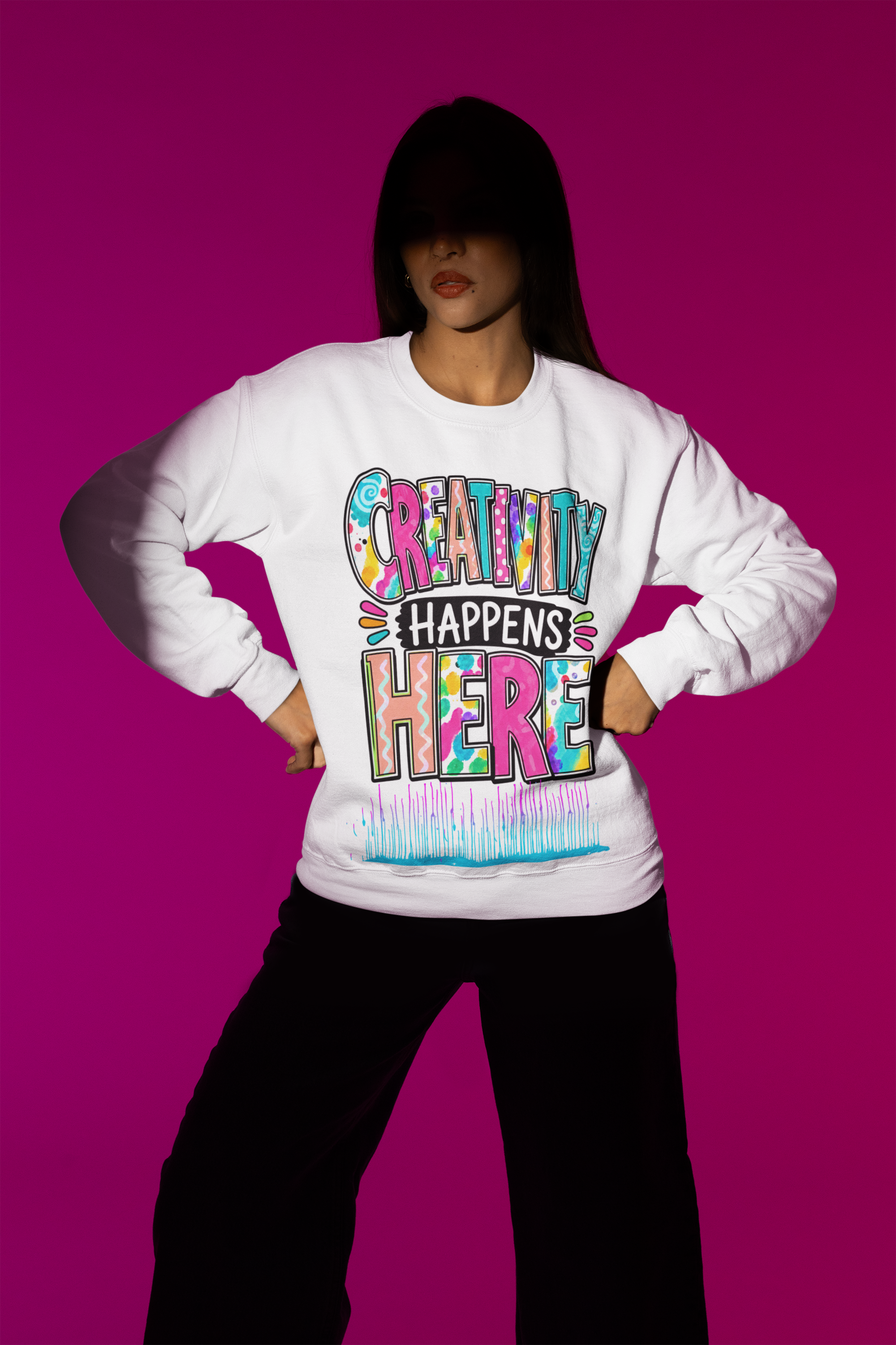 gildan-sweatshirt-mockup-featuring-a-woman-posing-under-a-spotlight-in-a-studio-m50005 (2).png
