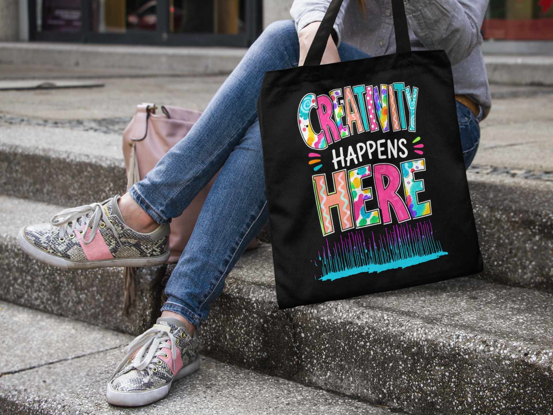 canvas-tote-bag-mockup-of-a-young-woman-sitting-on-stairs-a11491.png