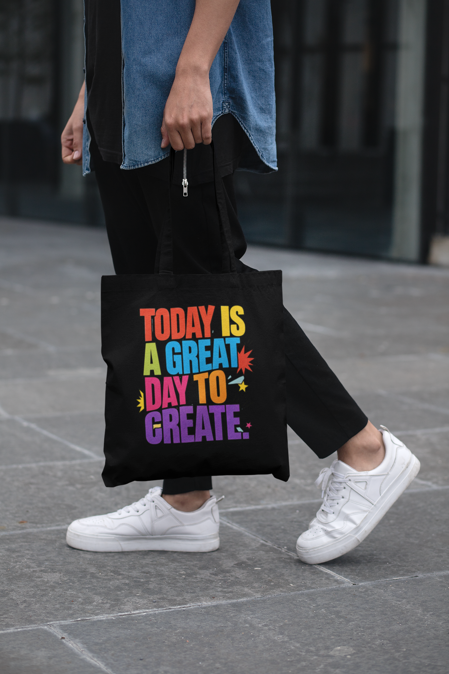 cropped-face-mockup-of-a-man-holding-a-tote-bag-in-the-street-29424.png