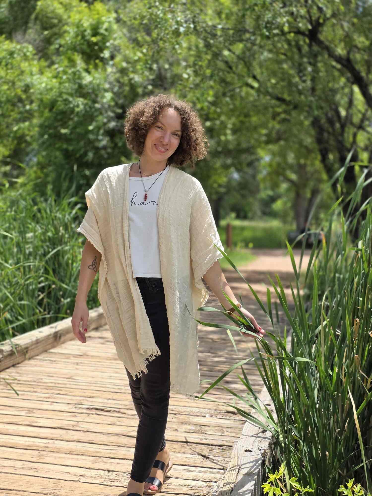 Copywriter Stéphanie McGuirt walking outside in Colorado