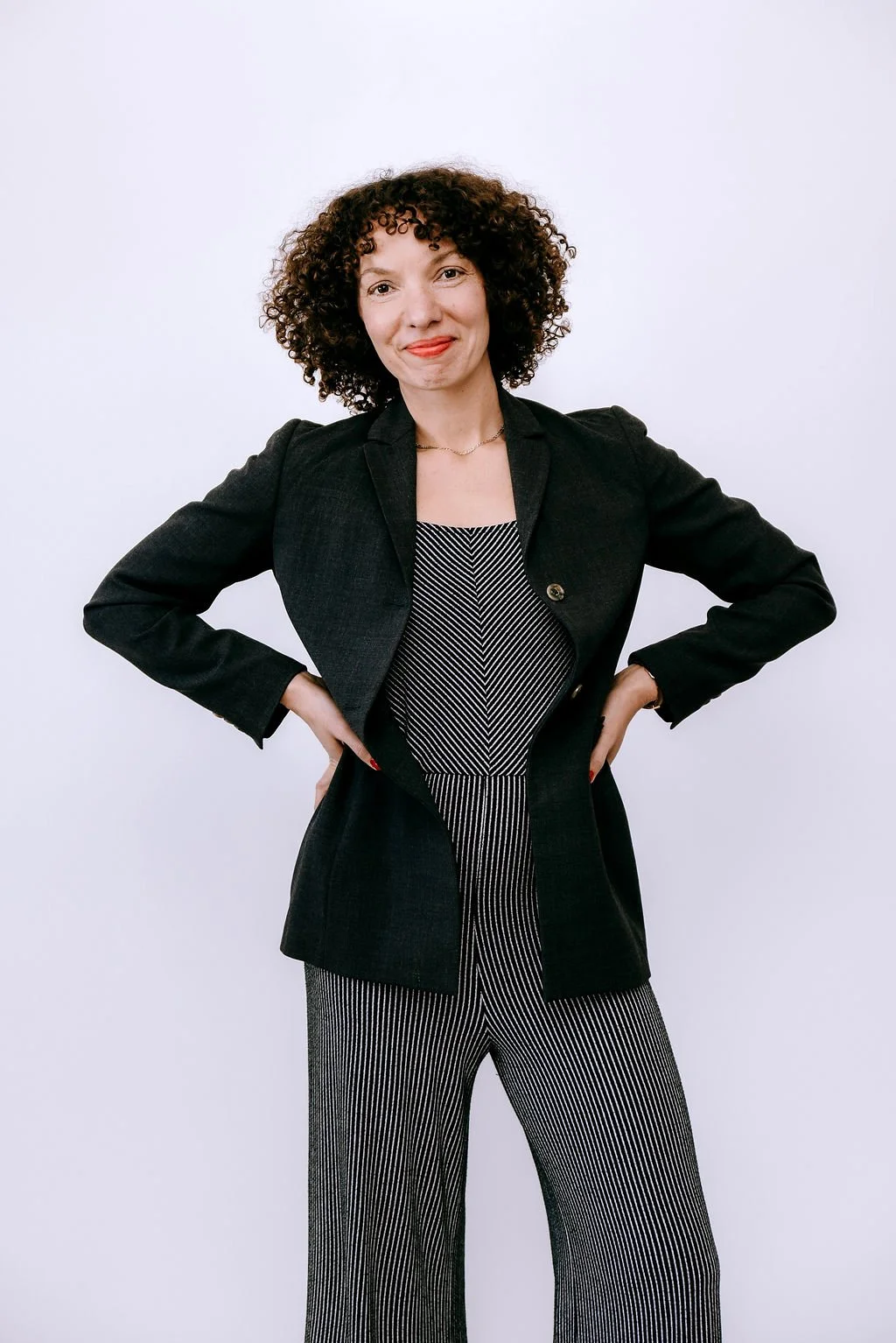 Copywriter Stéphanie McGuirt posing in a blazer