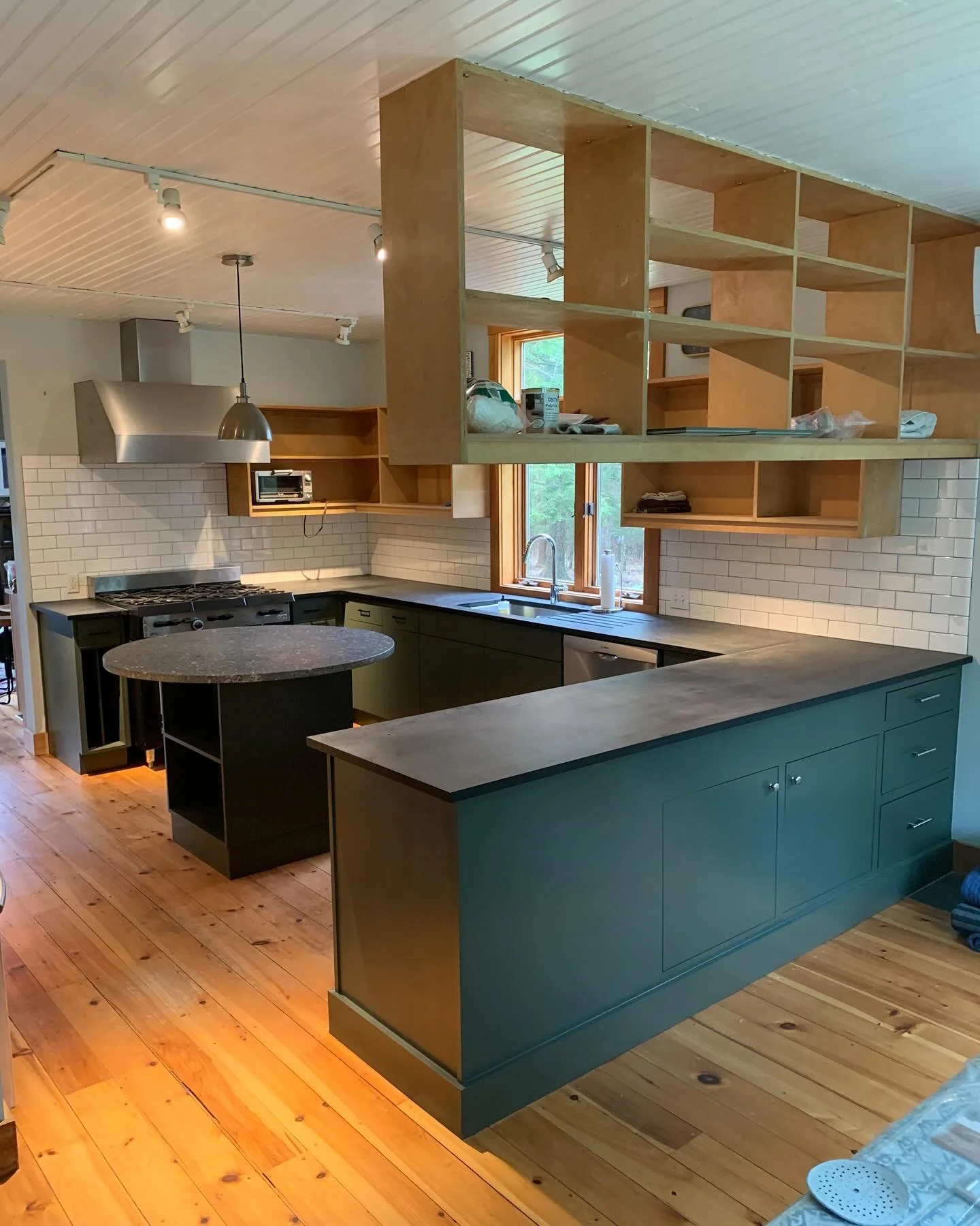 Cabinet repaint in Pownal. We use a premium waterborne coatings system with added hardener for a beautiful and durable finish. Swipe to see what we started with!