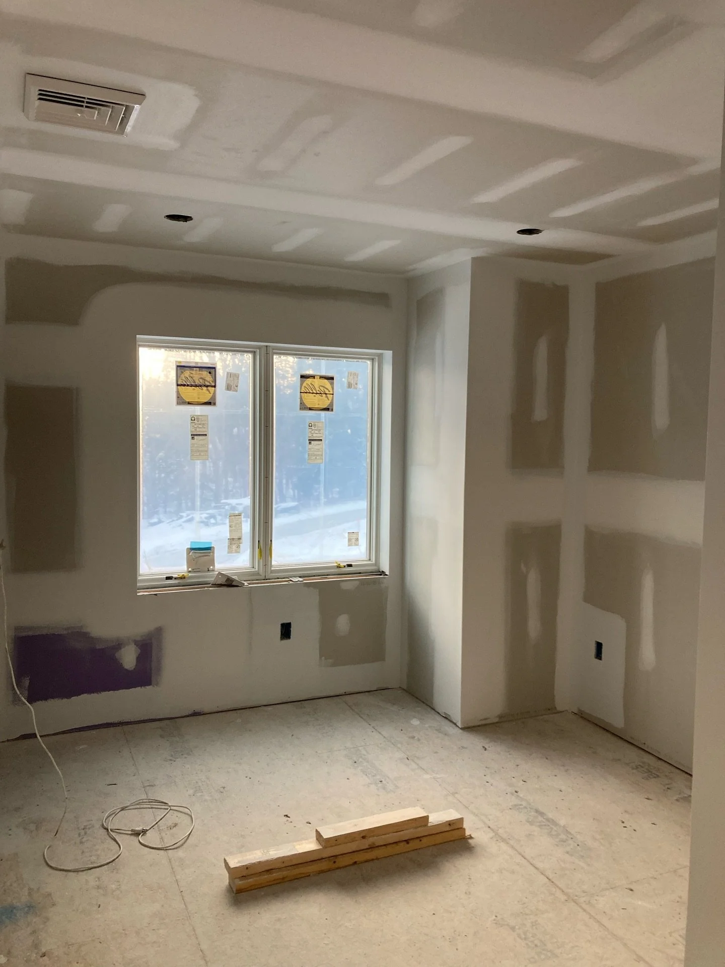 Progress on a new construction in Pownal. Primer, ceilings, and first coat before trim and floors are installed.