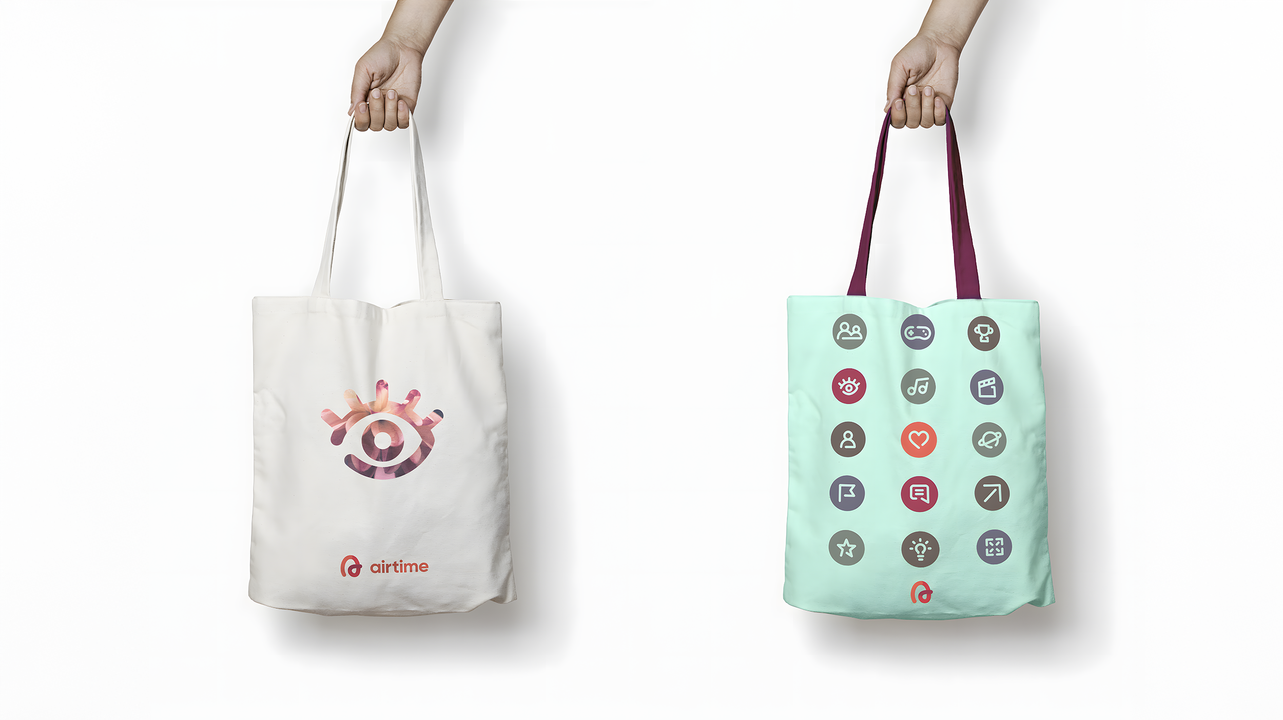 Airtime branded tote bags featuring eye icon logo and grid of colorful app icons on fabric