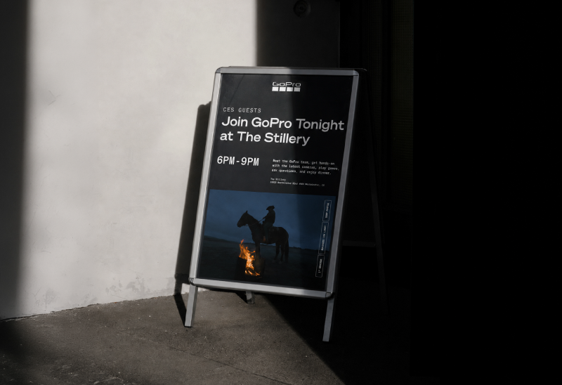 Event poster for a GoPro event at The Stillery, featuring a person on horseback near a fire at dusk, with event details in white text on a dark background.