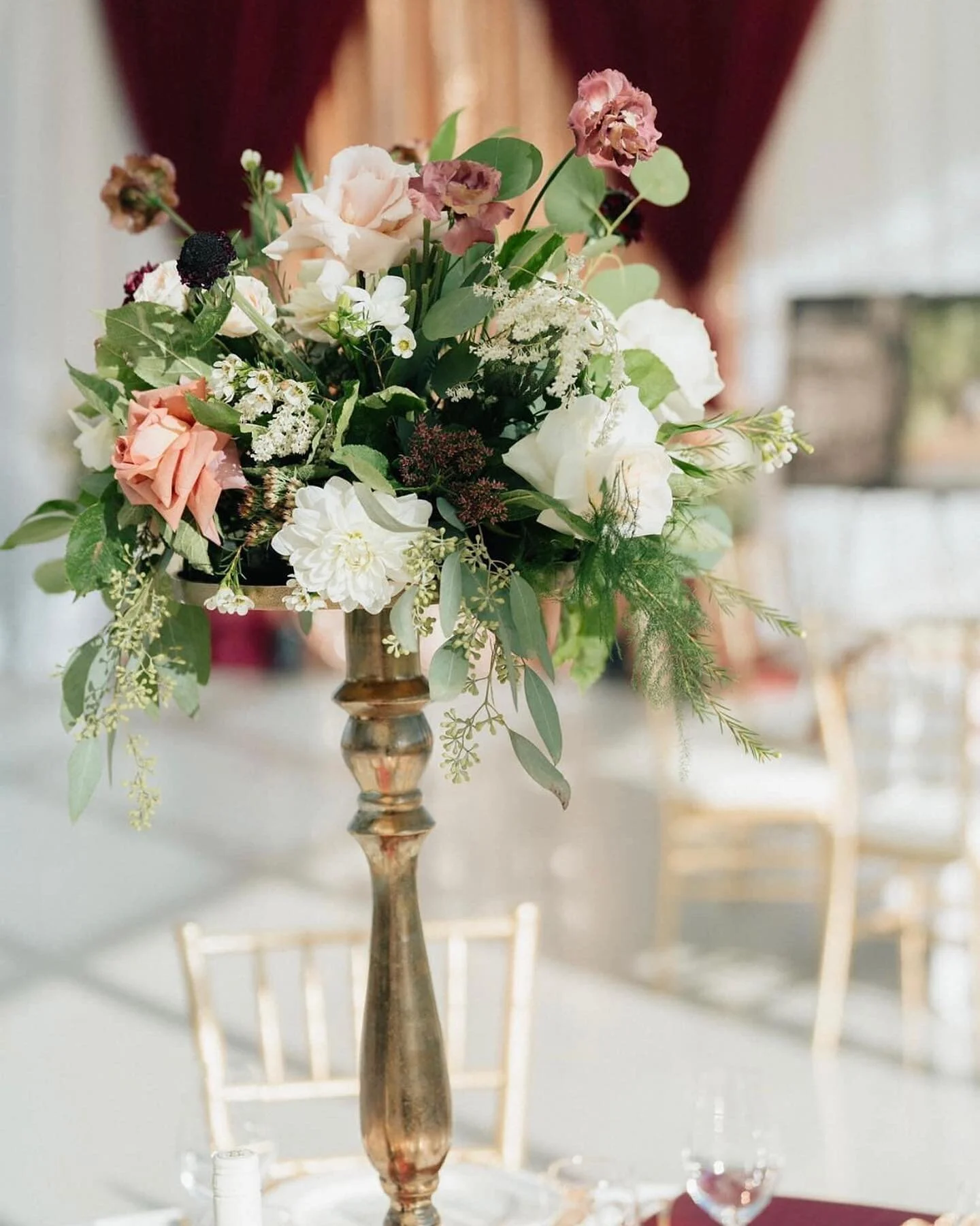 A glimpse of the reception floral repurposed from the ceremony. Monte Creeks winery nestled just outside of Kamloops overlooking vineyards and the river has a new glass encased venue for events and weddings! It was an absolute dream landscape to work