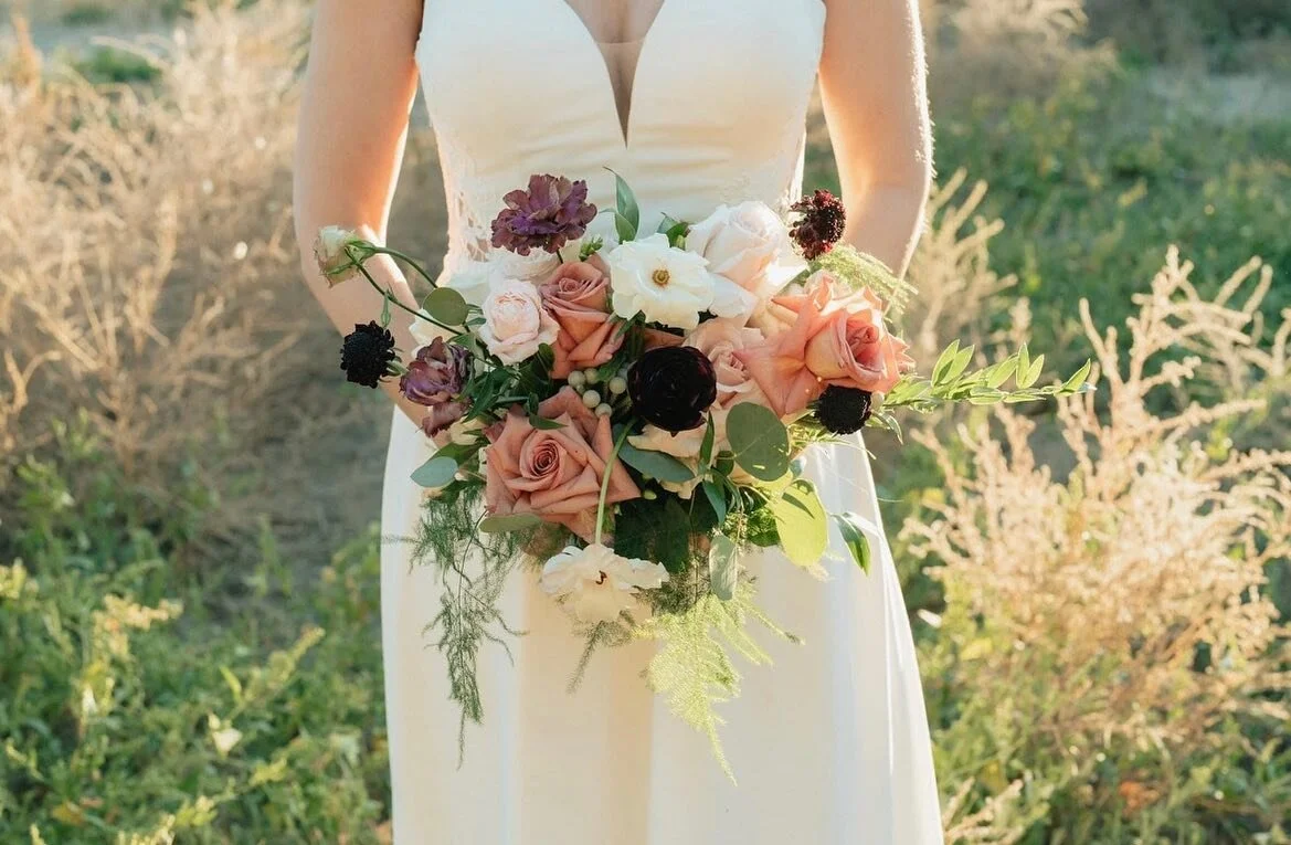 Robbie, such a beautiful soul. A true photo capturing her bouquet featuring barista roses, butterfly ranunculus,  lisianthus and spray roses. 
Photography by the very talented @lisanovakphoto 
Venue @montecreekwinery