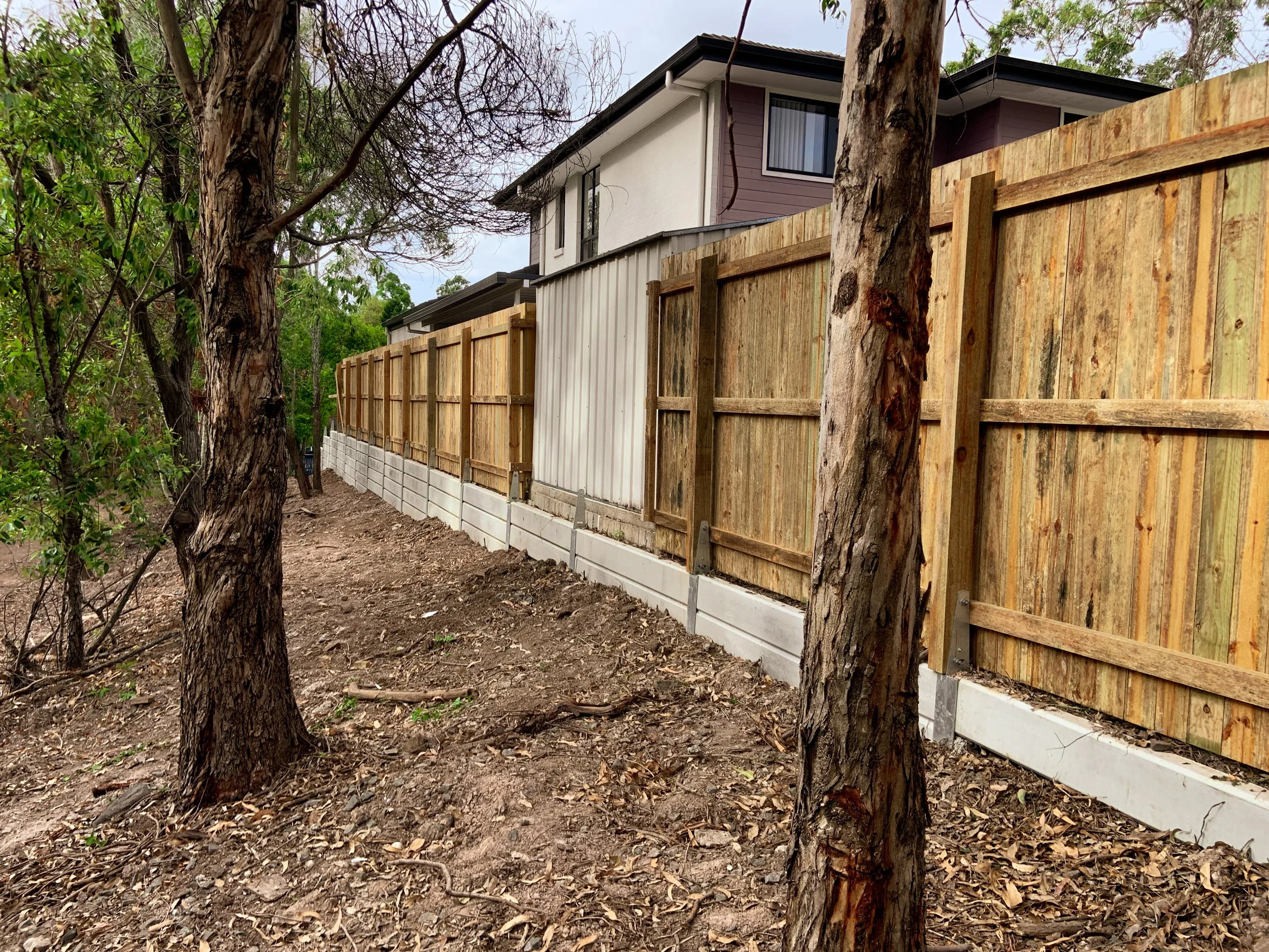 Fence and retaining wall