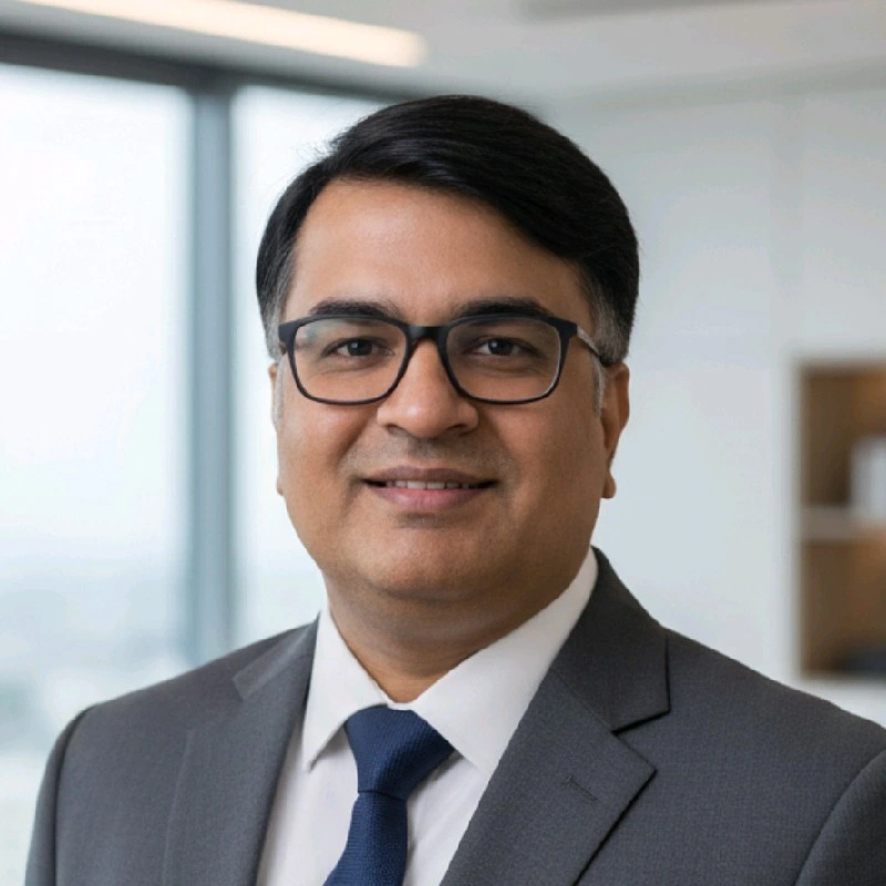 A photo of a man wearing glasses