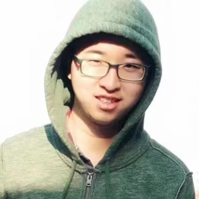 A picture of a man with a hoodie