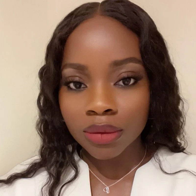 A headshot of a black woman