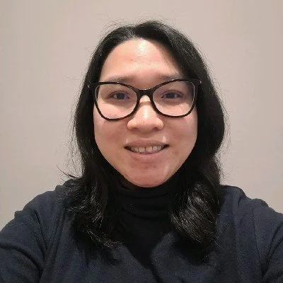 A woman with glasses