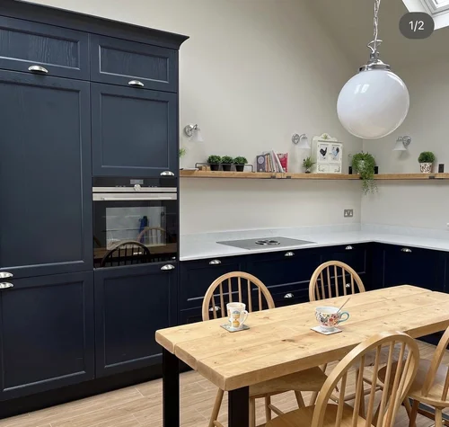 A dark blue kitchen designed by Lime Grove Interiors.