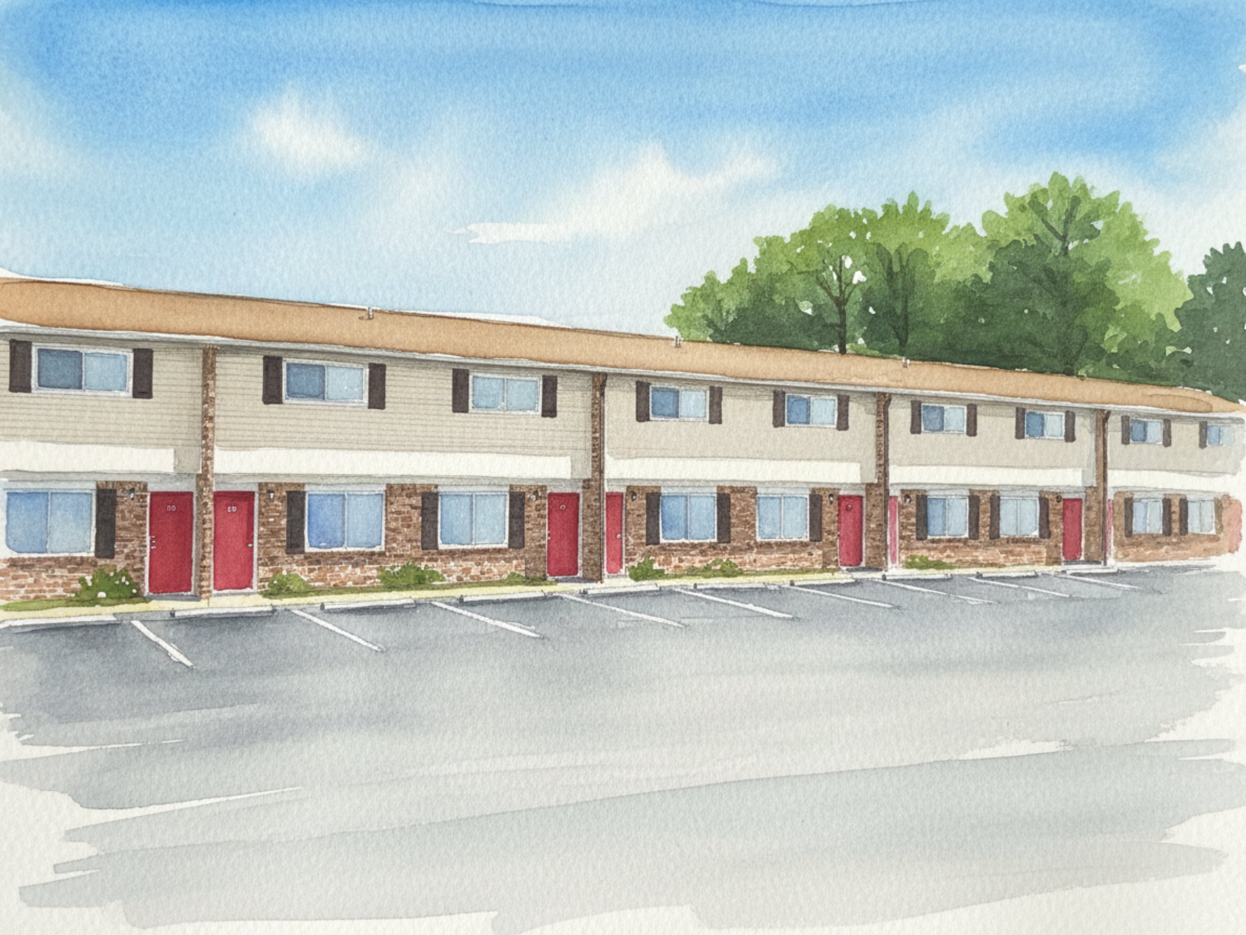 A picture of tranquil townhouses, a 40 unit apartment community for sale.