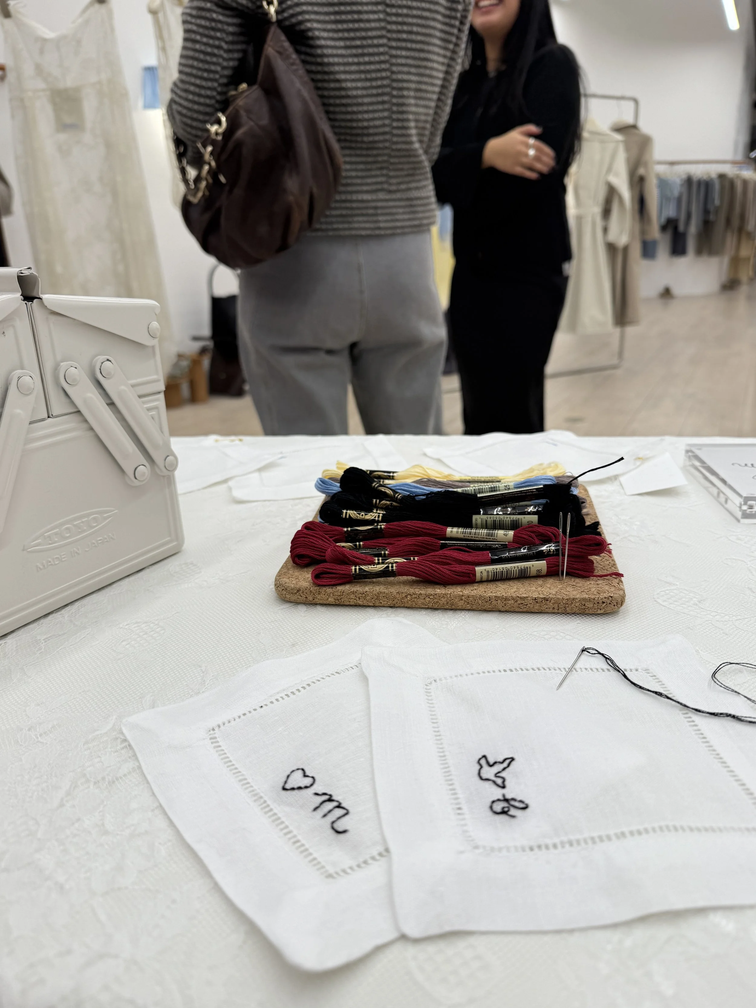 Live hand embroidery at a brand activation event