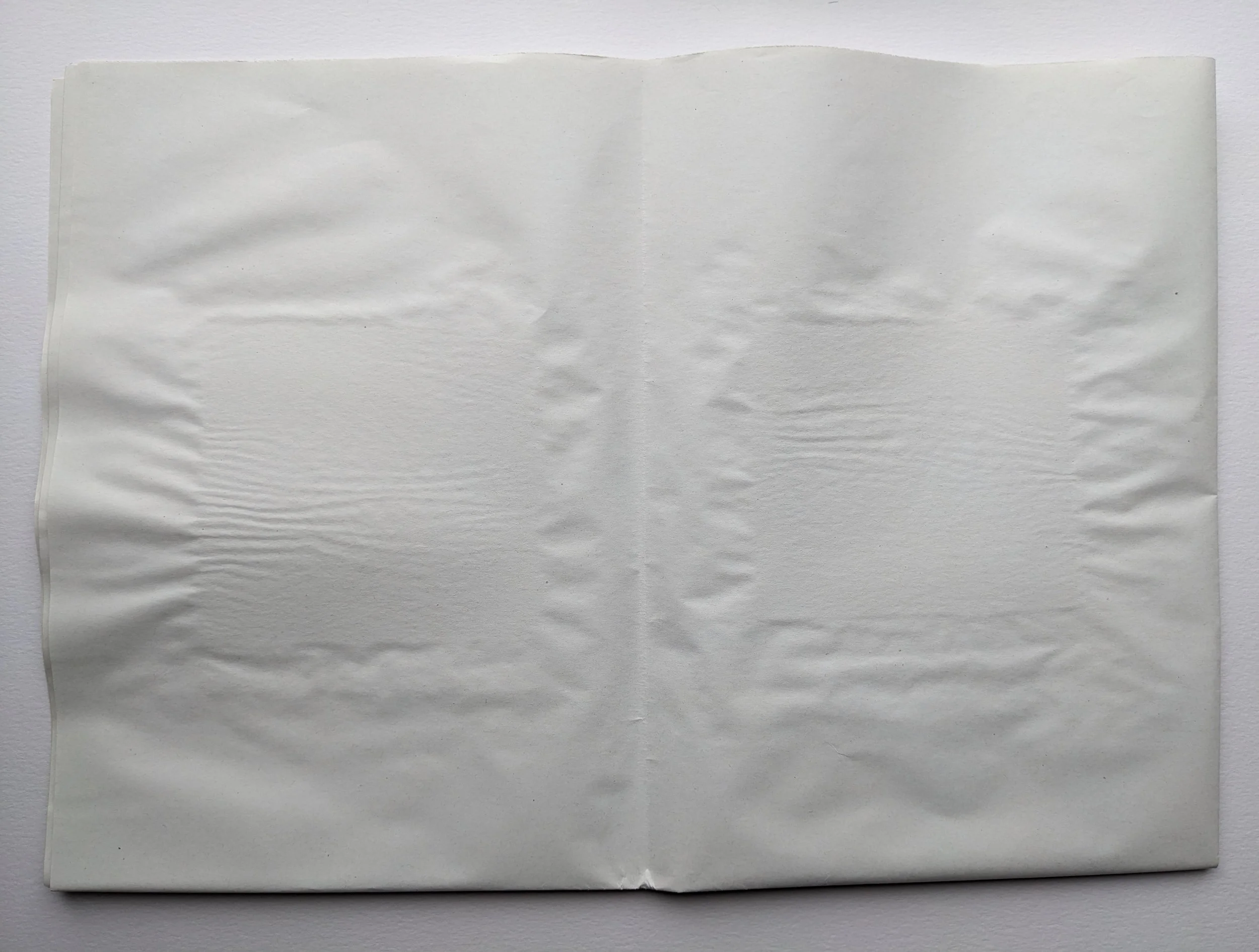 Aluminium (2024).  Folded newsprint.