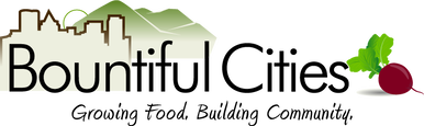 Graphic logo with the text 'Bountiful Cities' and a city skyline, green leaves, and a cherry.