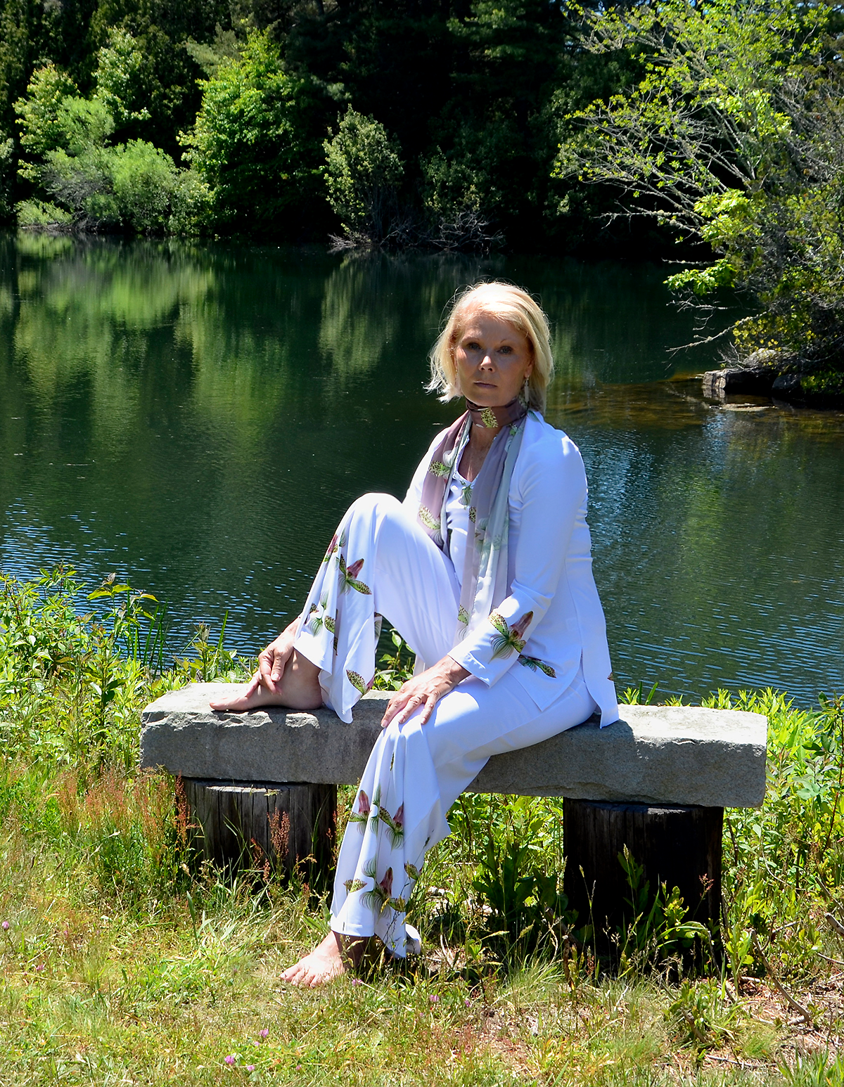 tiwia resilience shoot orchid tunic and pant seated stone bench 1.png