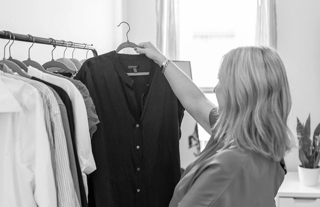 JGP Styled Me holding black dress