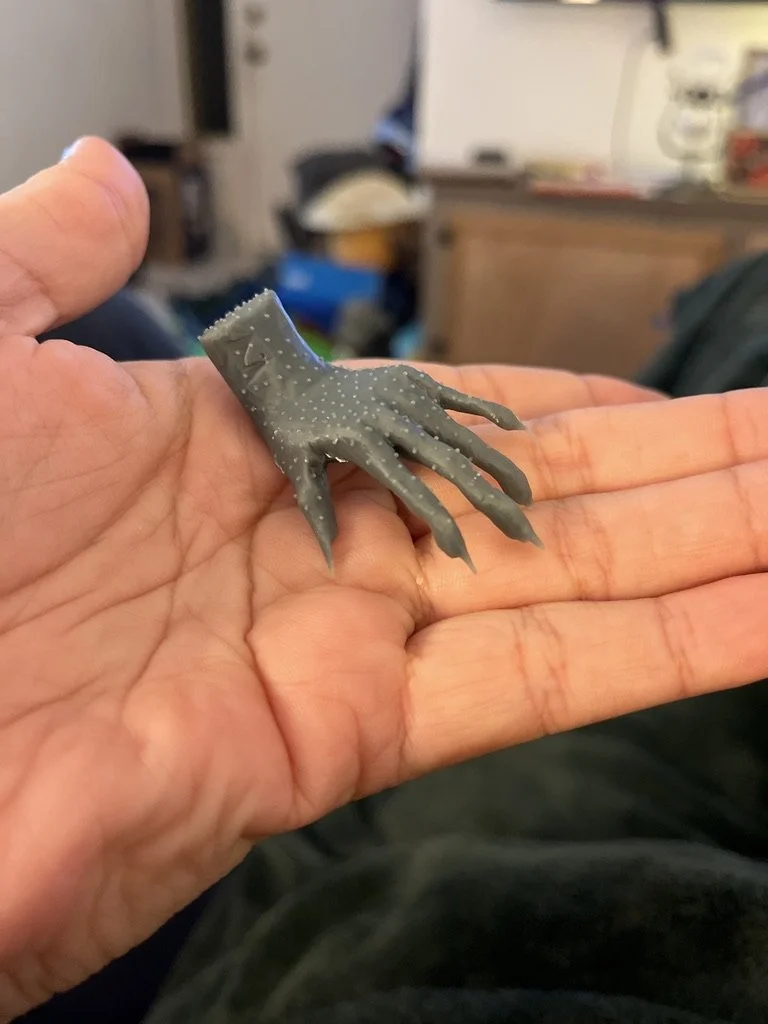 first print of my first attempt to 3D model a hand from scratch using Blender