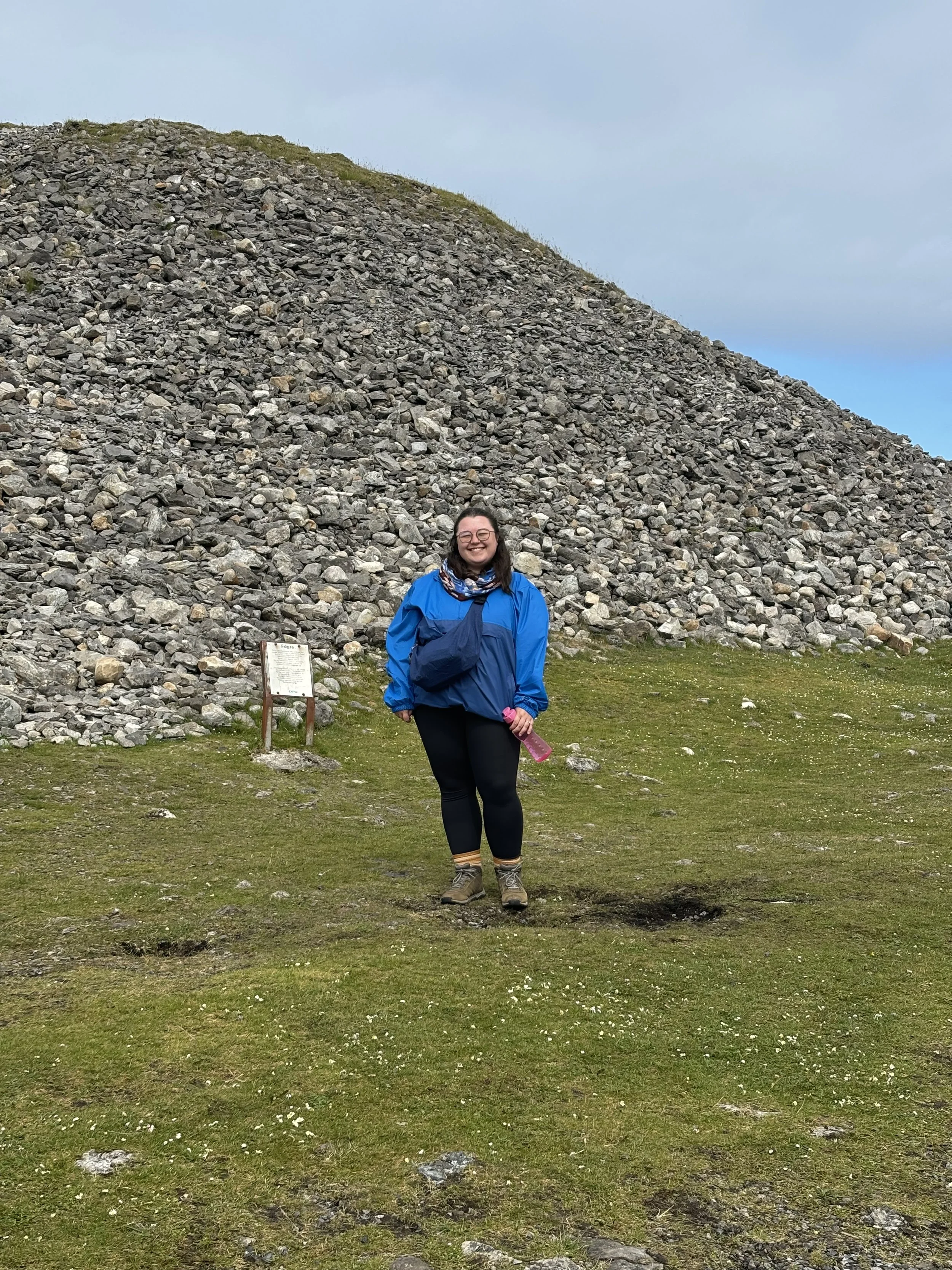 Wendy at the cairn (of Queen Maeve) on Knocknarea in Co Sligo, Ireland in 2024. 