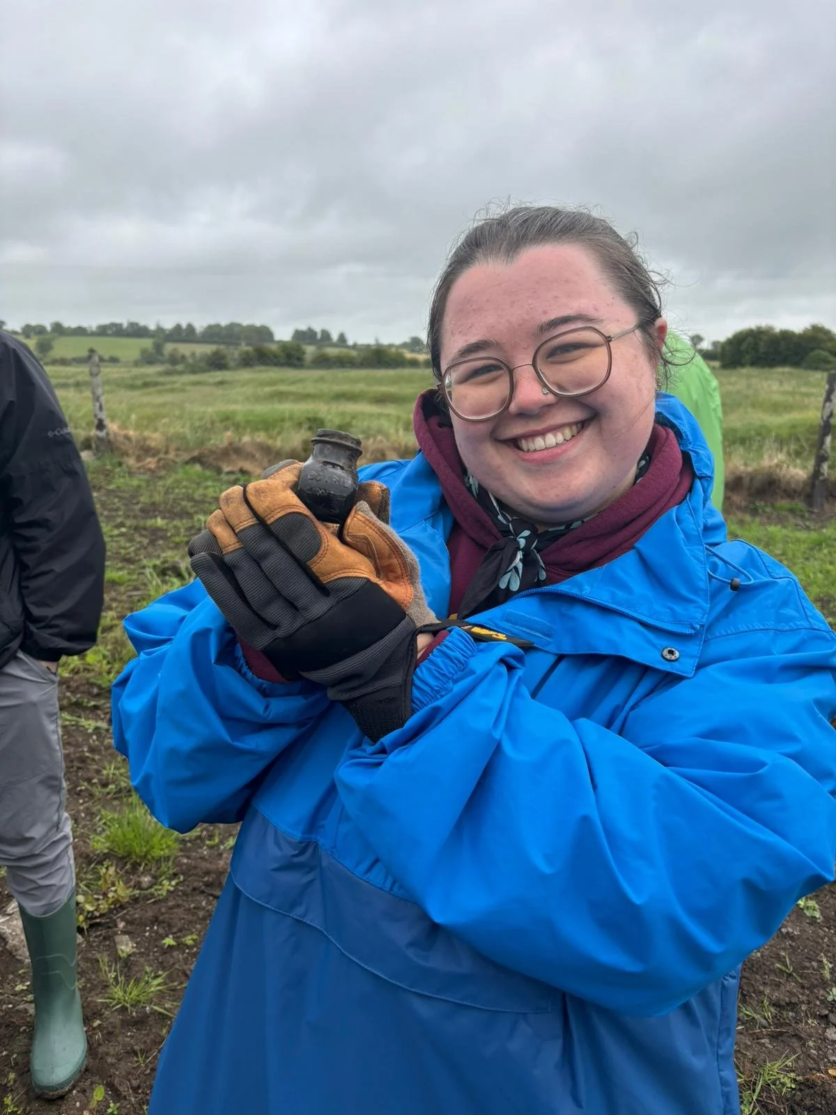 Wendy holding a small modern jar found during a foot survey in Ballintubber, Co Roscommon, Ireland.