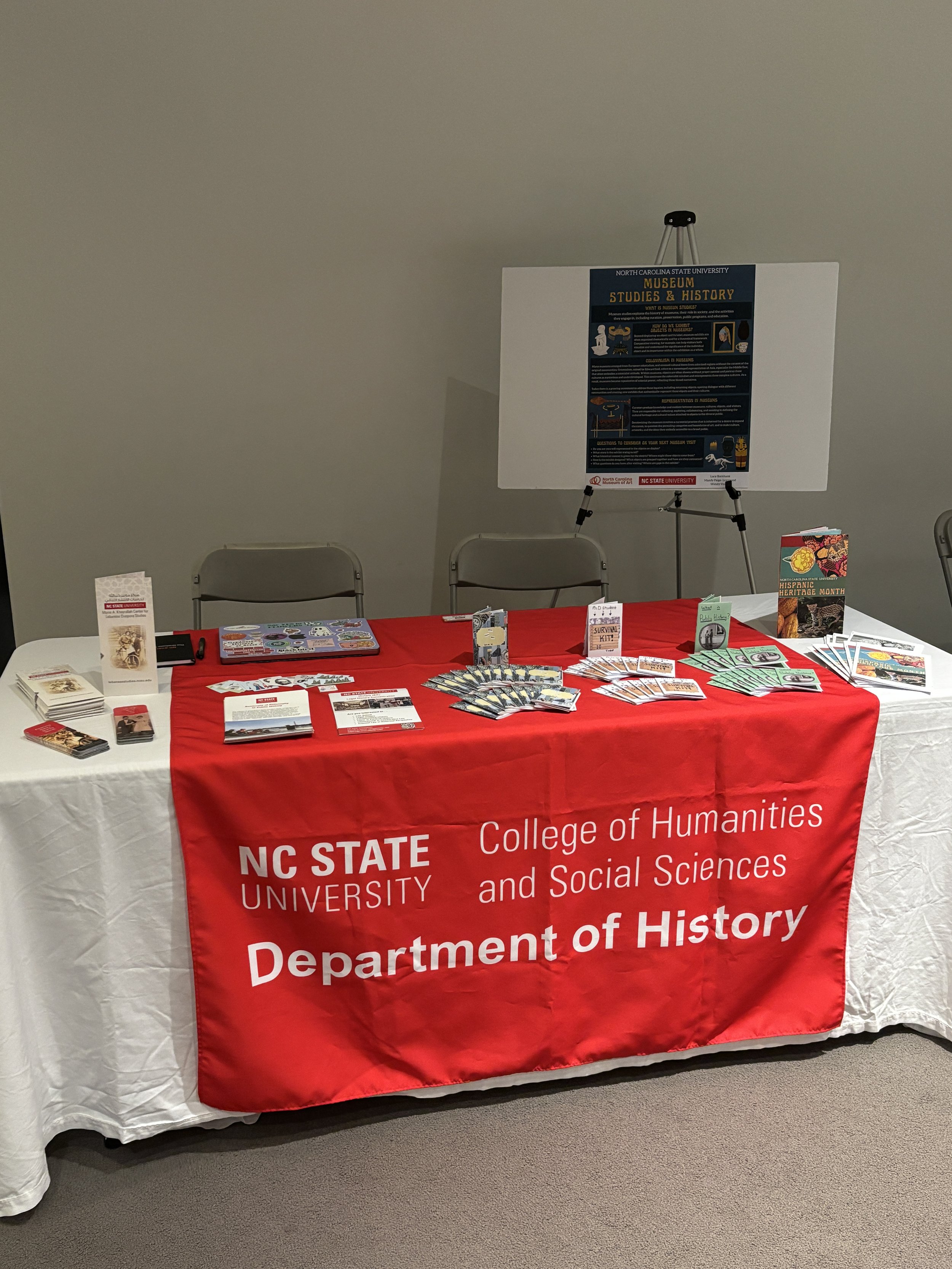 Table for the NCSU Department of History at the 2025 End Papers at the North Carolina Museum of Art where Wendy coordinated NCSU students to make zines that were then given out at the event. 