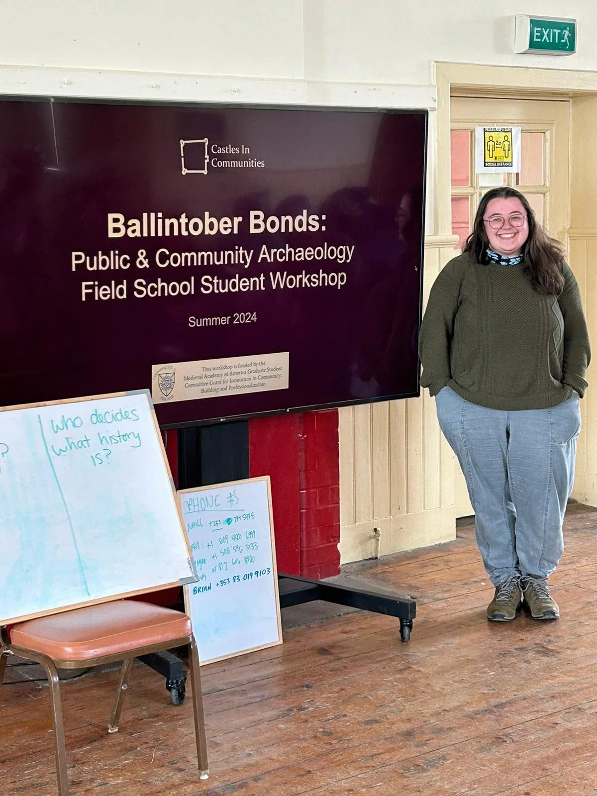 Wendy presenting on public and community archaeology to field school students in Ballintubber, Ireland in 2024. 