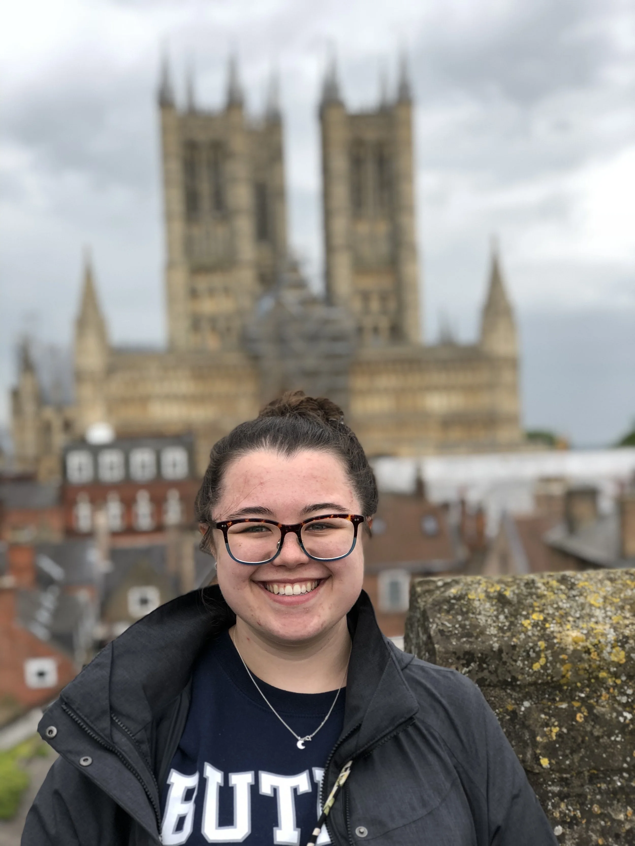 Wendy in front of Lincoln Cathedral in Lincoln, England in 2019. 