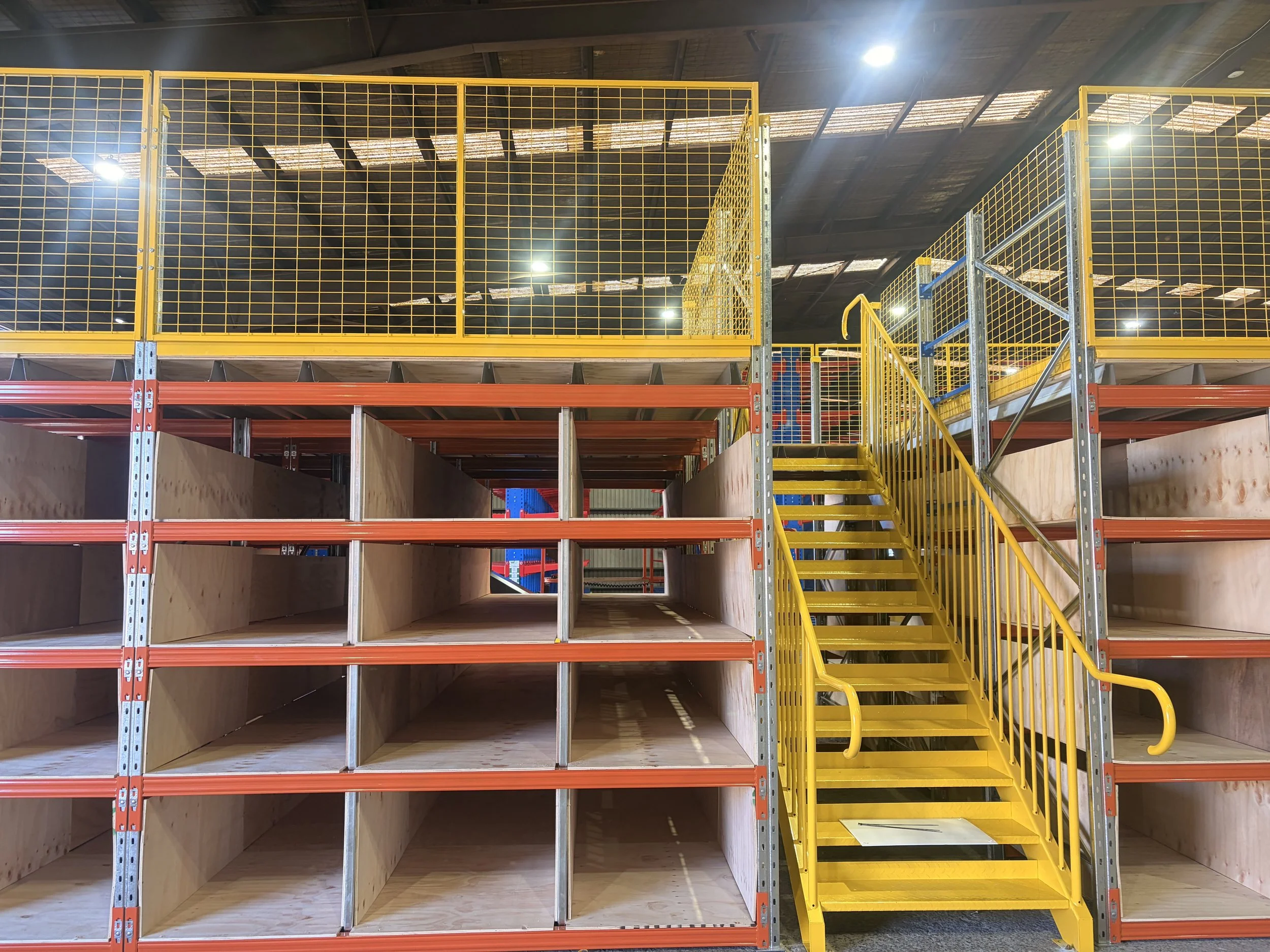Mezzanine Stairs Pigeon Hole Install.jpg