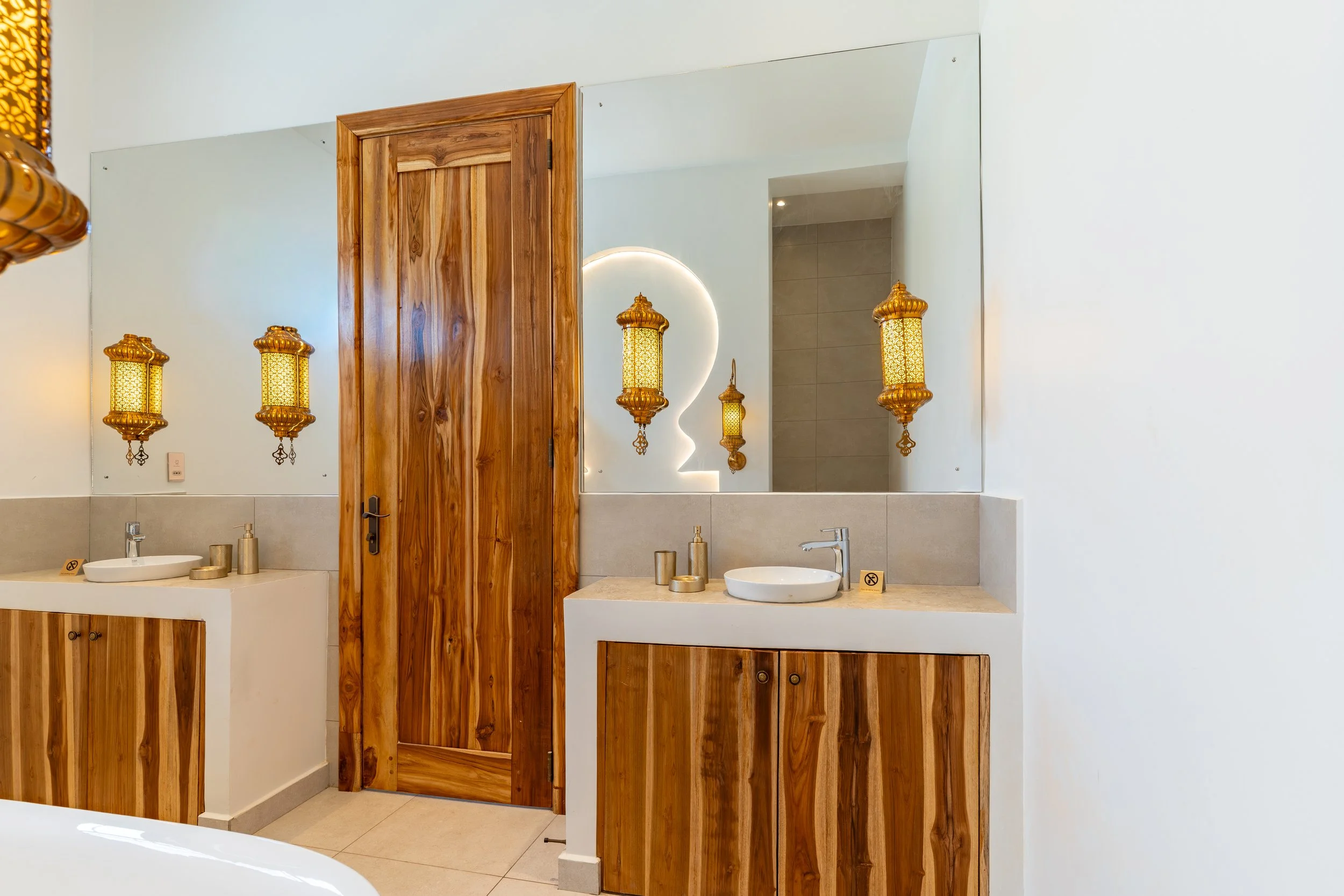 Master Bathroom Facing Mirrors.jpg