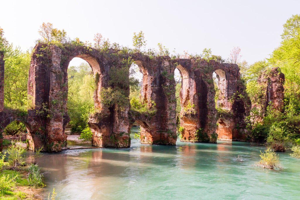 roman-aqueduct-of-ancient-nikopolis-that-starts-from-the-northern-end-of-the-valley-of-the-louros-near-the-village-of-St.-George-north-of-Filippiada-Preveza-Greece-1024x683.jpg