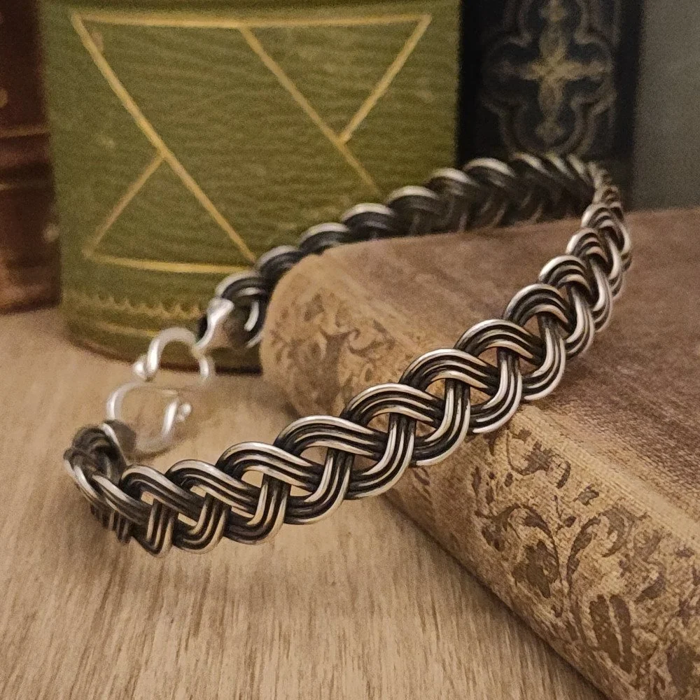 Platt fläta, 9 trådar, oxid - 1340 kr.jpg