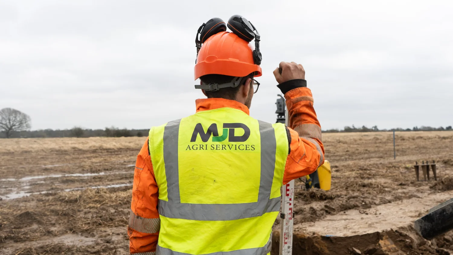 MJD Agri Services team member setting out on site