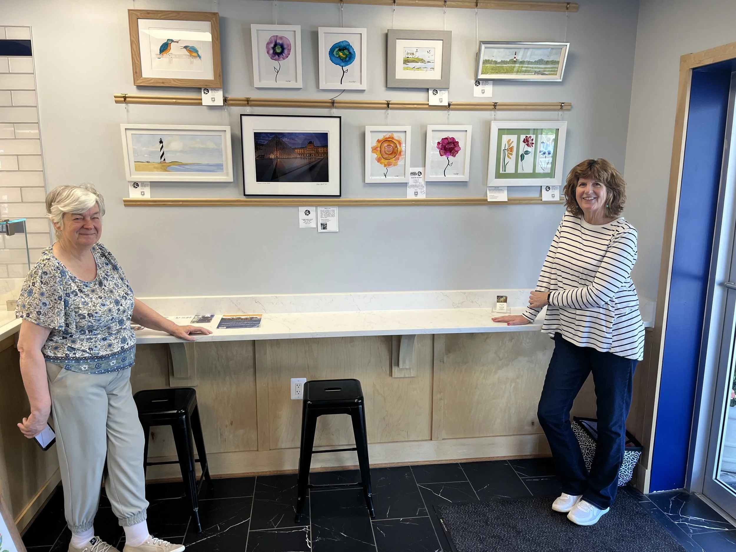 Linda Jones (left), Sandy Buffie (right) and Robin Kent (not shown) at the Blue Chicken Bakery