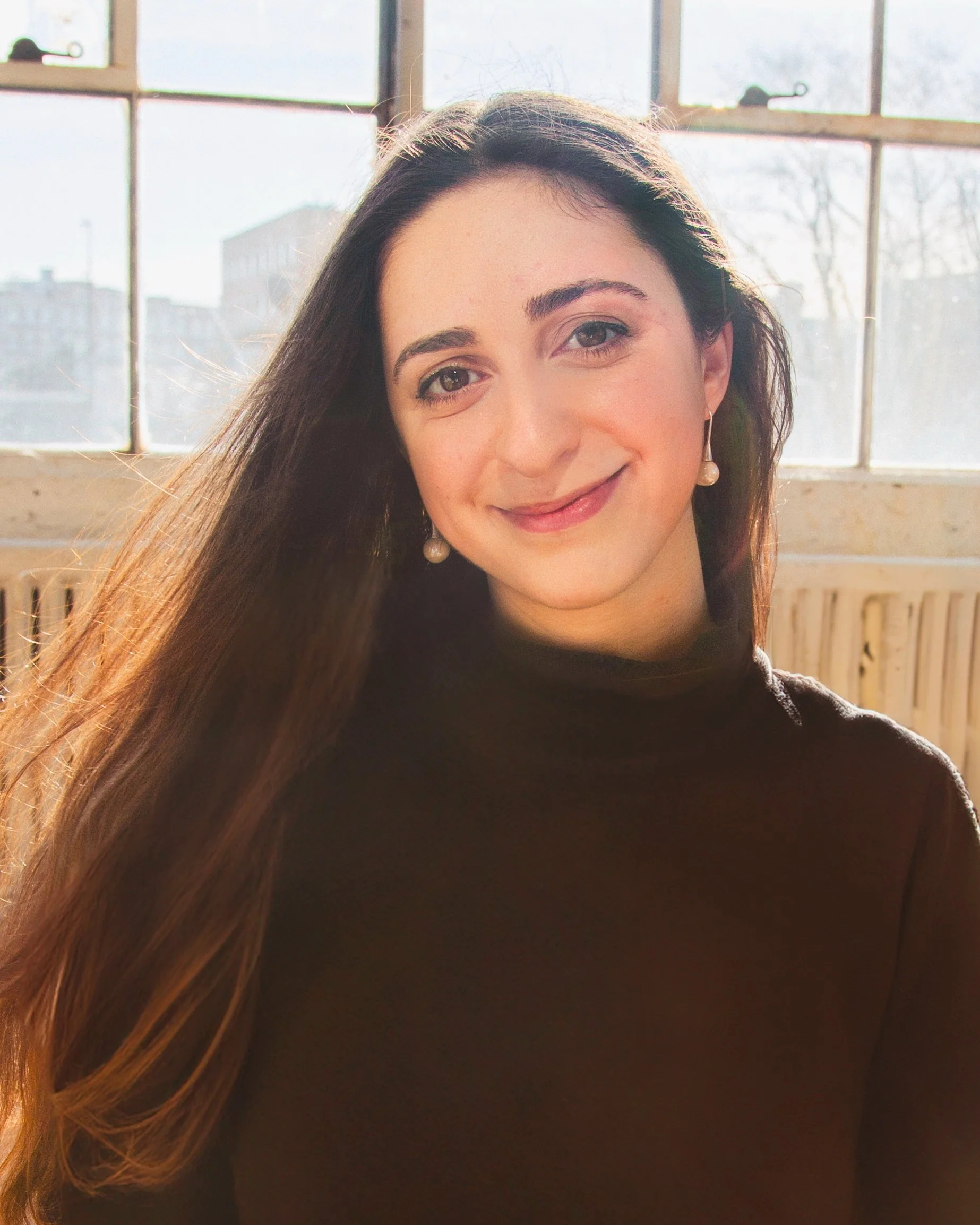 crop use eliya headshot 2 (1).jpeg