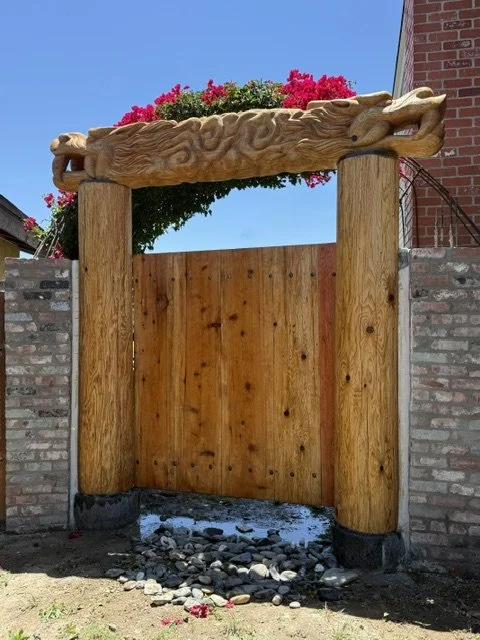 Door with dragon overlay, July 2026, Redwood and metal