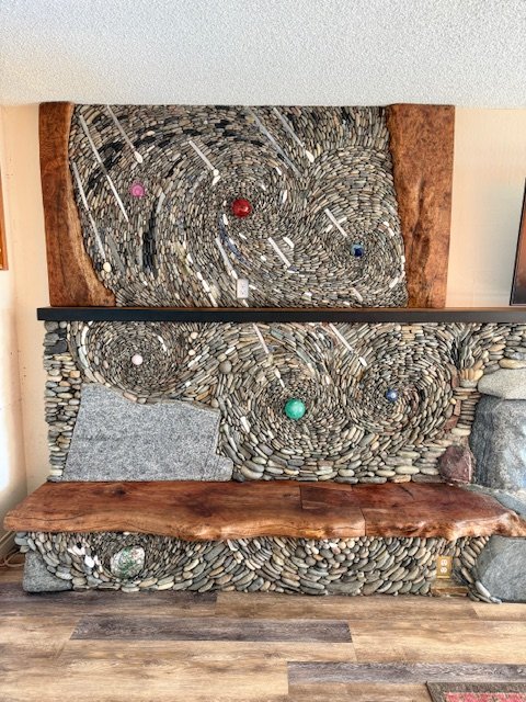 Worldly fireplace, January 2026, River rock, crystal, maple wood, 15'x10'