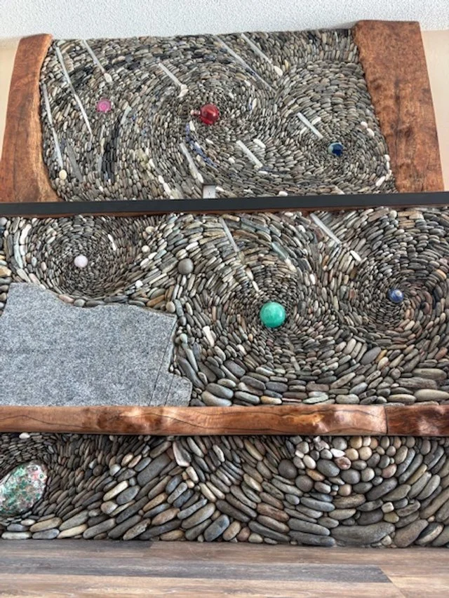 Worldly fireplace, January 2026, River rock, crystal, maple wood, 15'x10'