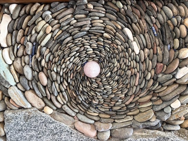 Worldly fireplace, January 2026, River rock, crystal, maple wood, 15'x10'