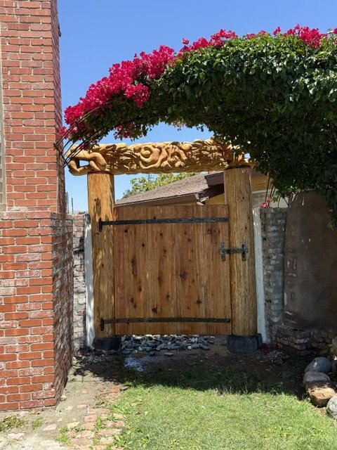 Door with dragon overlay, July 2026, Redwood and metal