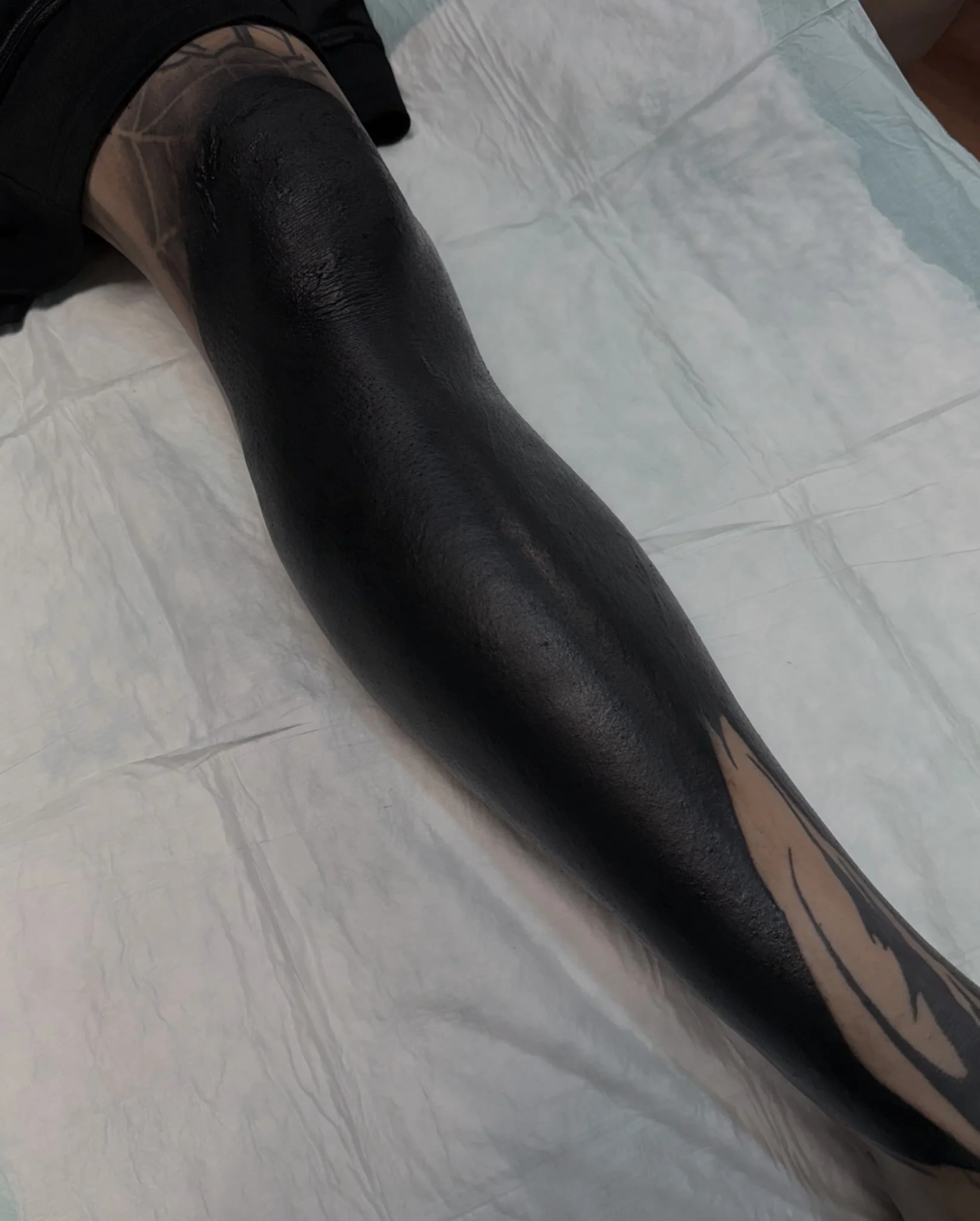 Leg blackout session 1
Covered some scars and other tattoos
.
.
.
.
.
If you want to get blackwork done, send me a DM. I will always have time to blackout something.
. 
. @vitalitreetattoo 
.
@notattoopain use code john10
.
.
.
.
Booking for 2026-202
