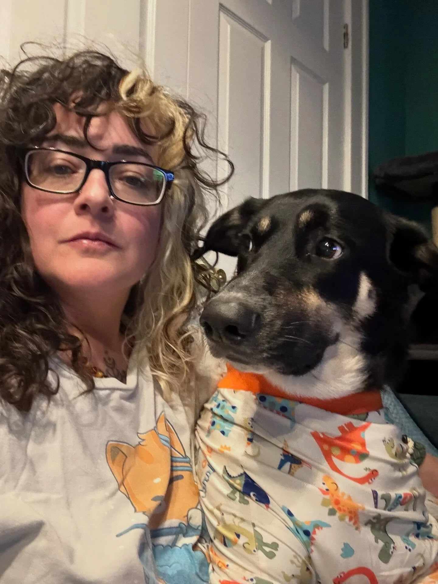 She thinks it&rsquo;s a punishment but we&rsquo;re just trying to keep her from licking and scratching some sensitive spots. She rarely crawls in my lap like this. But! She did settle peacefully and slept really well last night, so I think it&rsquo;s