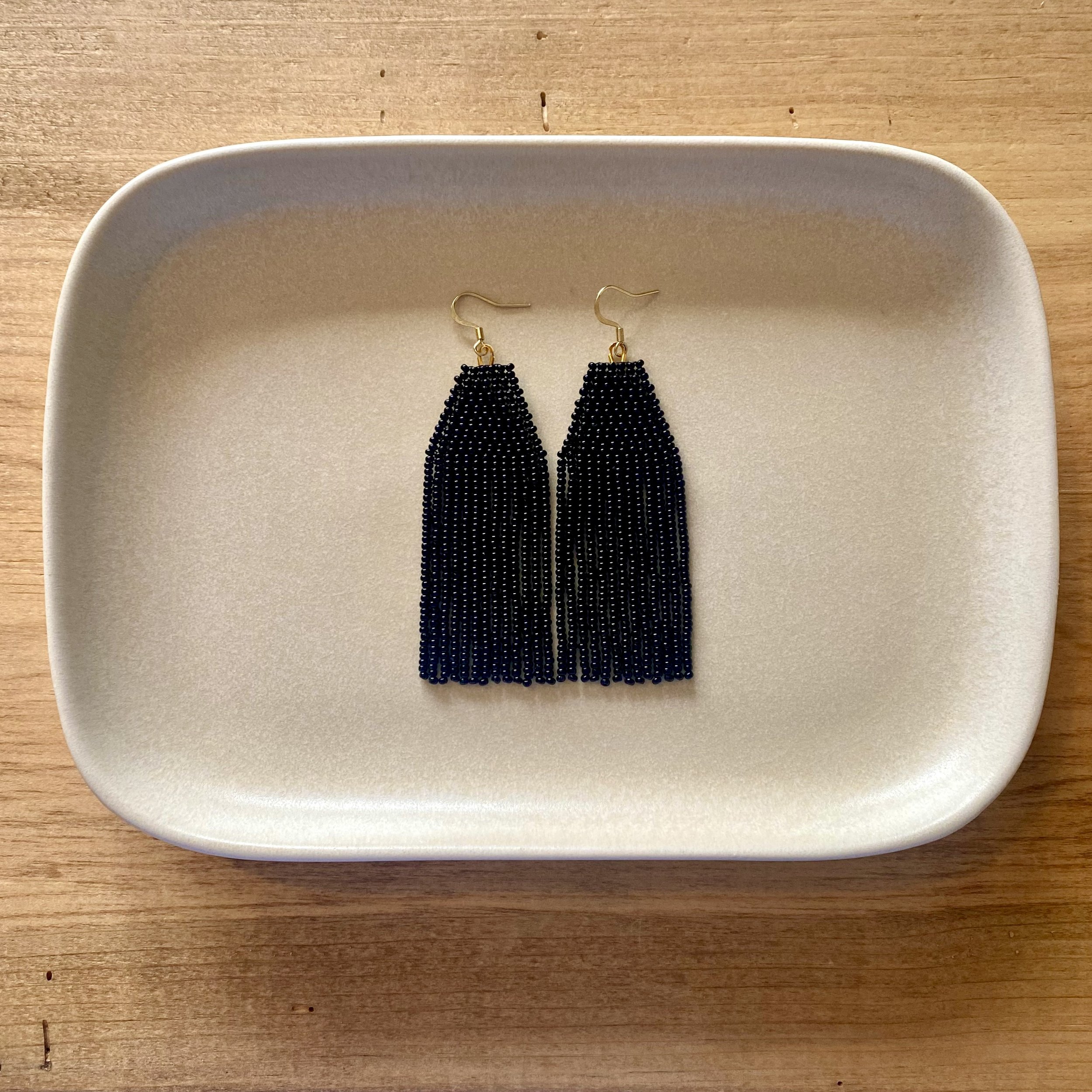 Solid fringes, black