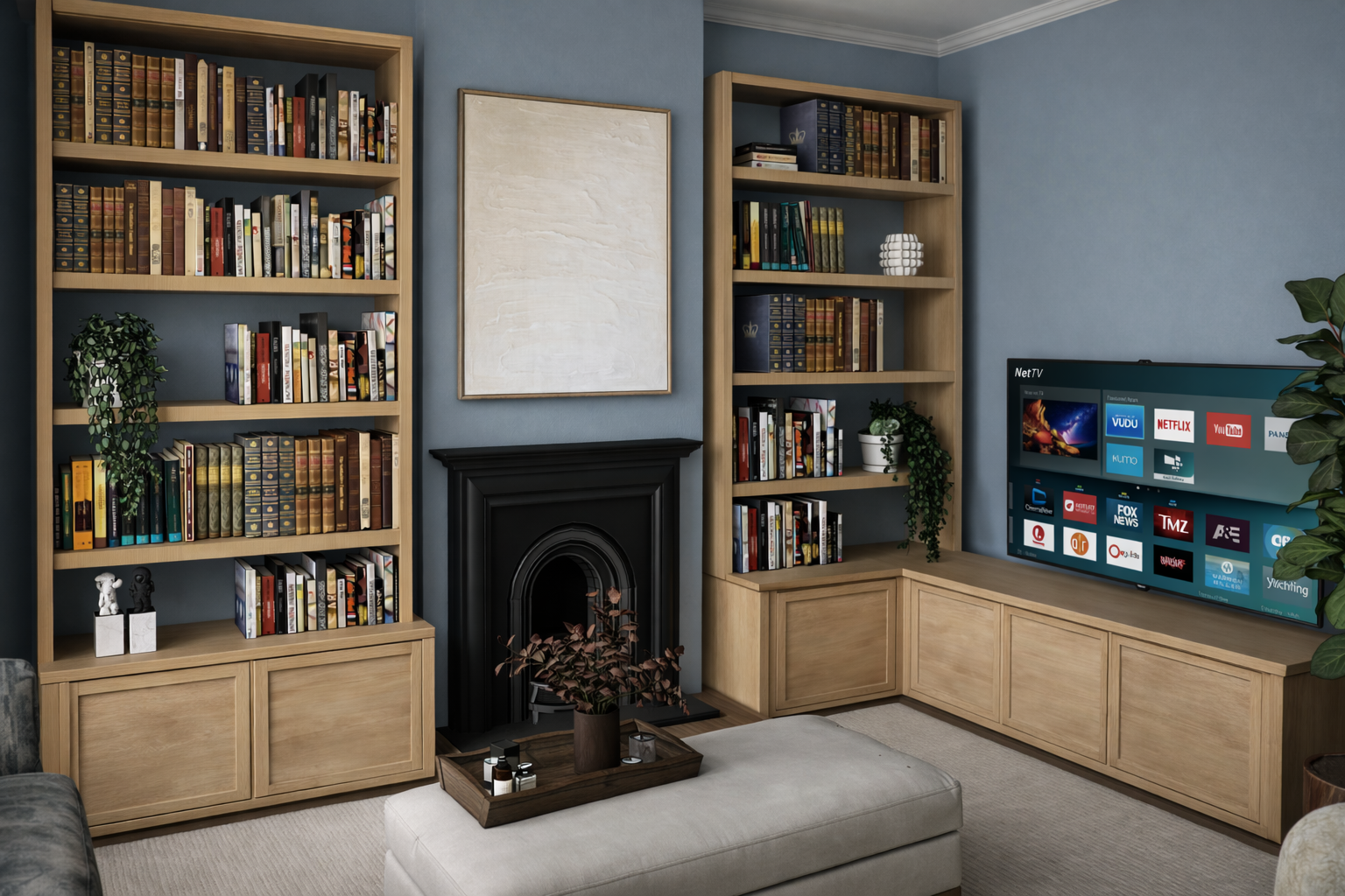 Living room with two wooden bookshelves filled with books, a black fireplace with a plant beside it, a TV displaying streaming service icons, a beige ottoman with a wooden tray and bottles on top, and a wall with a blank canvas.